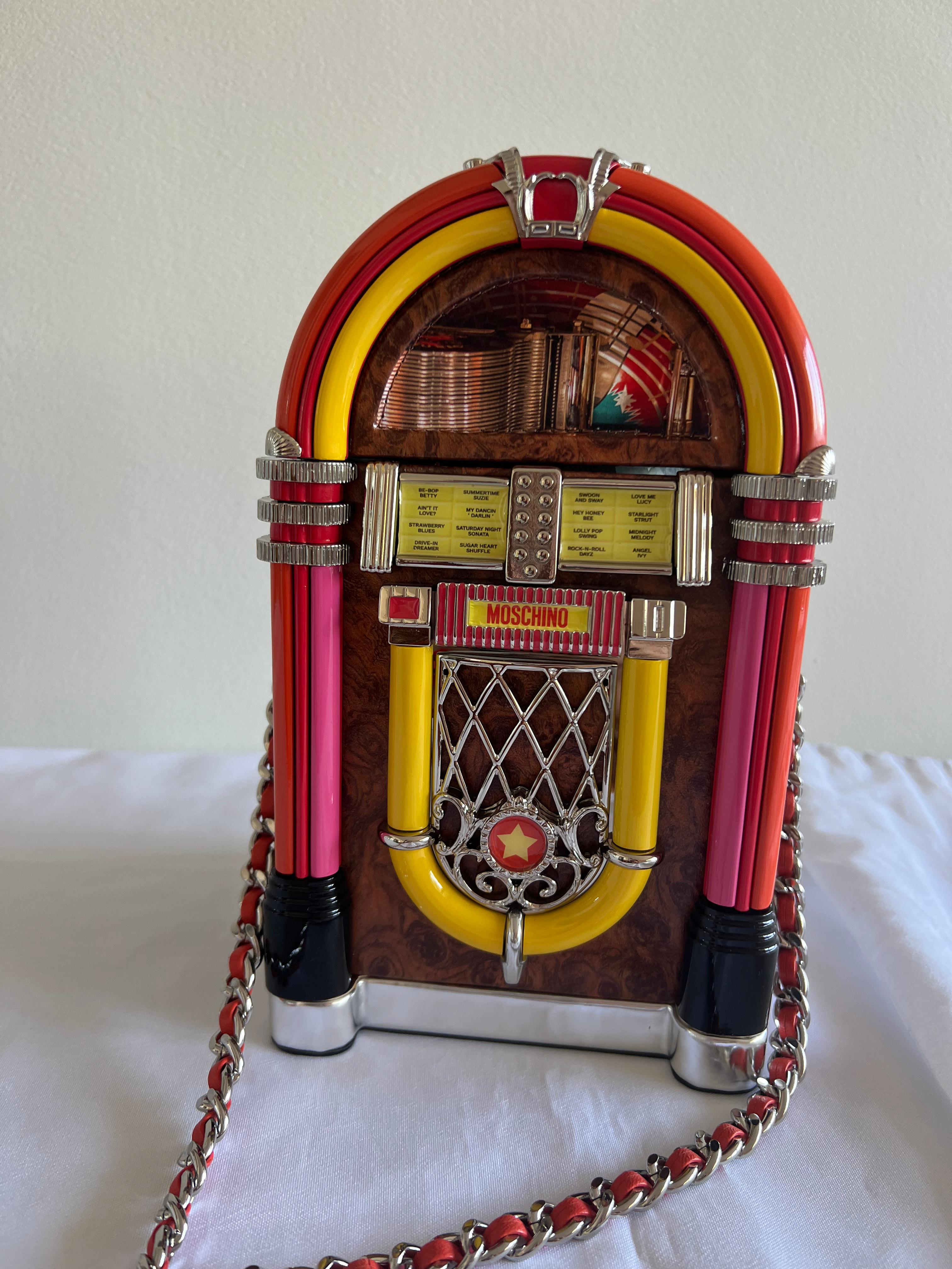
*Same Day Shipping*

*BEAUTIFUL & UNIQUE COLLECTIBLE DEADSTOCK PIECE*

MOSCHINO COUTURE

 Jukebox 50's Brown Multi-color Shoulder Bag 

SS2022 Diner Collection by Jeremy Scott



MSRP $3,645!


Rare and Highly Sought After Collector's Item




SOLD
