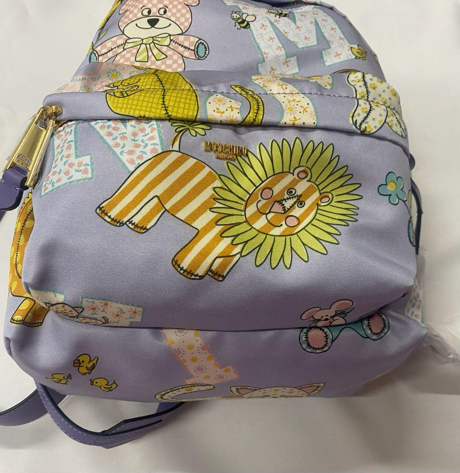 *ONLY ONE IS AVAILABLE*
*Awesome Out Of  Stock Item!*

MOSCHINO COUTURE

Kids Fantasy Purple Lion Teddy Bear Backpack

SS22 collection by Jeremy Scott



MSRP $595+tax!



SUPER CUTE!

100% Authentic!!!



Condition: Brand new with tags, original