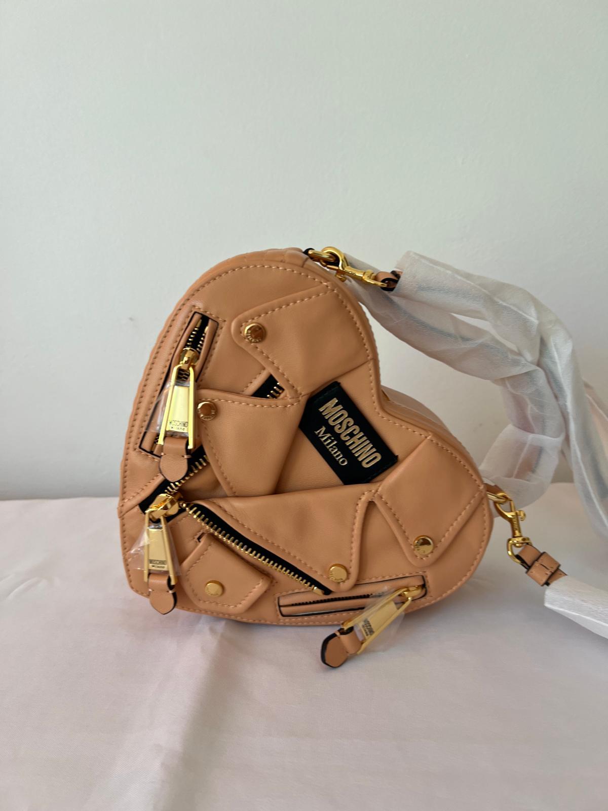 Orange SS22 MOSCHINO Couture Jeremy Scott Peach Heart Shaped Leather Biker Jacket Bag For Sale