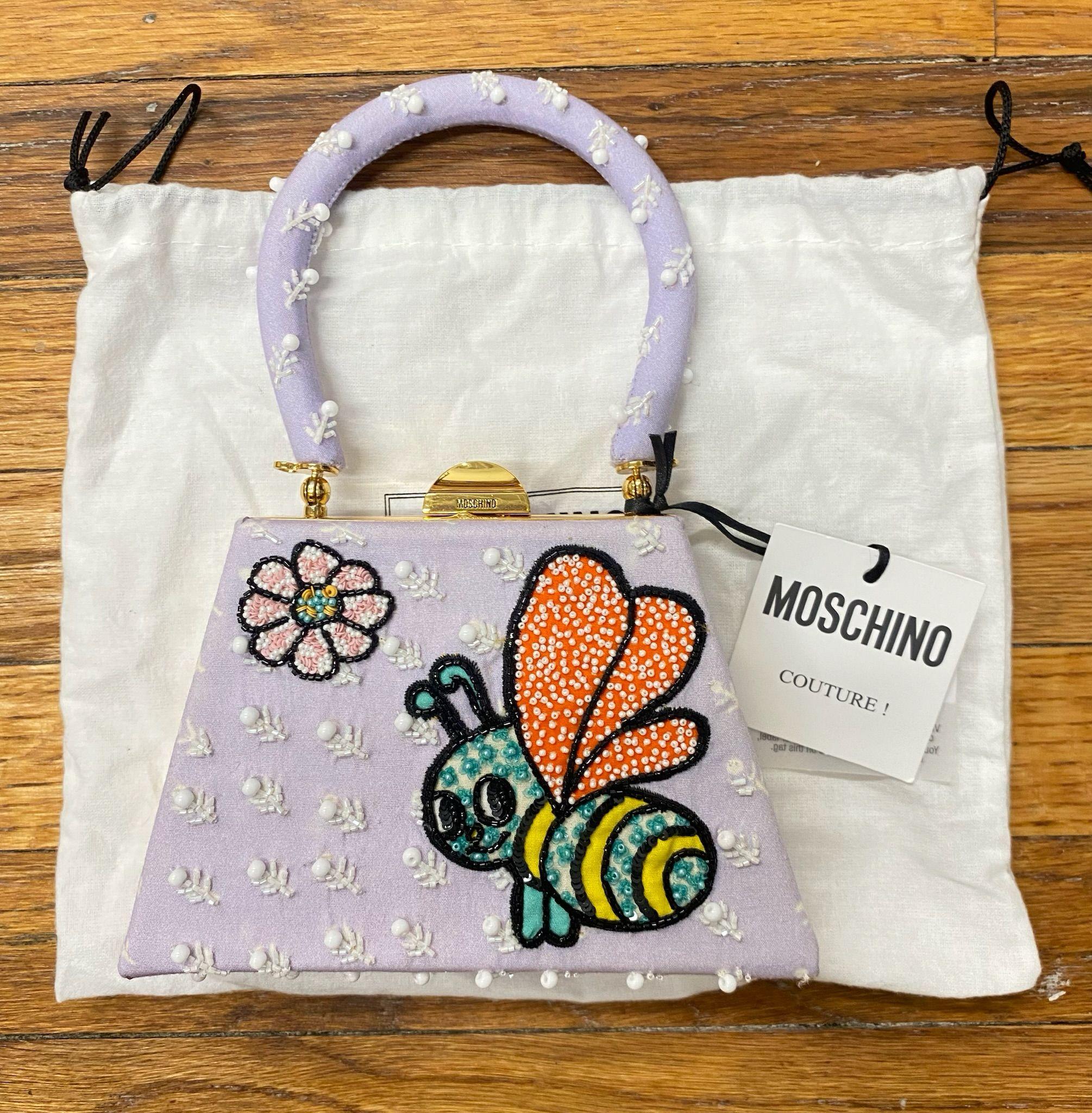 Women's SS22 MOSCHINO Couture Jeremy Scott Purple Child's Fantasy Trapeze Bee Handbag For Sale