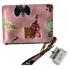 SS22 Moschino Couture Jeremy Scott Damen-Cocktailkleider aus rosa Leder mit Leder-Clutch