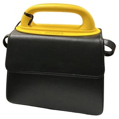 SS23 MOSCHINO Couture Jeremy Scott Sac à main noir avec poignée jaune