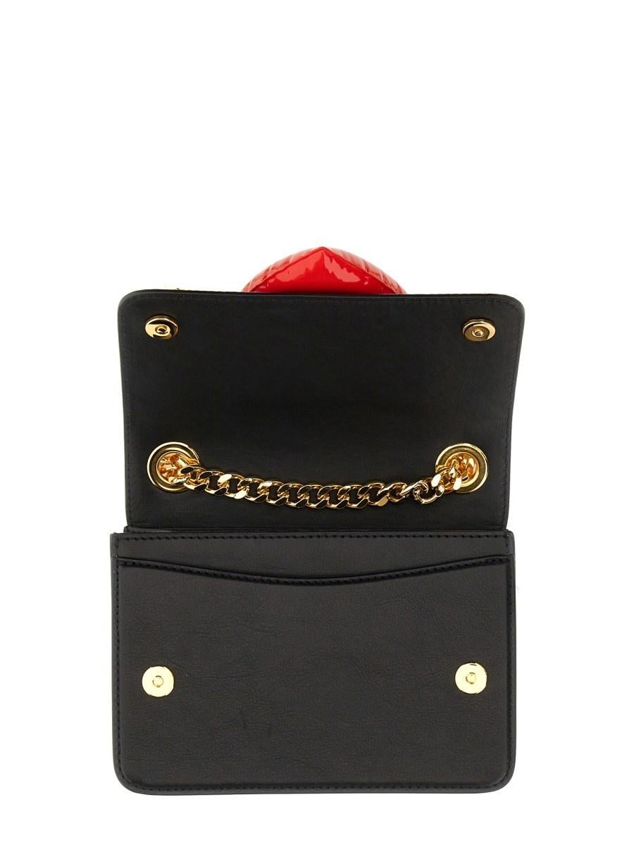 SS23 Moschino Couture Jeremy Scott Baie en cuir noir avec cœur rouge gonflable Pour femmes en vente