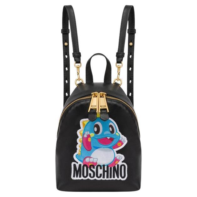 SS24 MOSCHINO Couture Jeremy Scott Black with Blue Bubble Bobble Dragon Backpack For Sale
