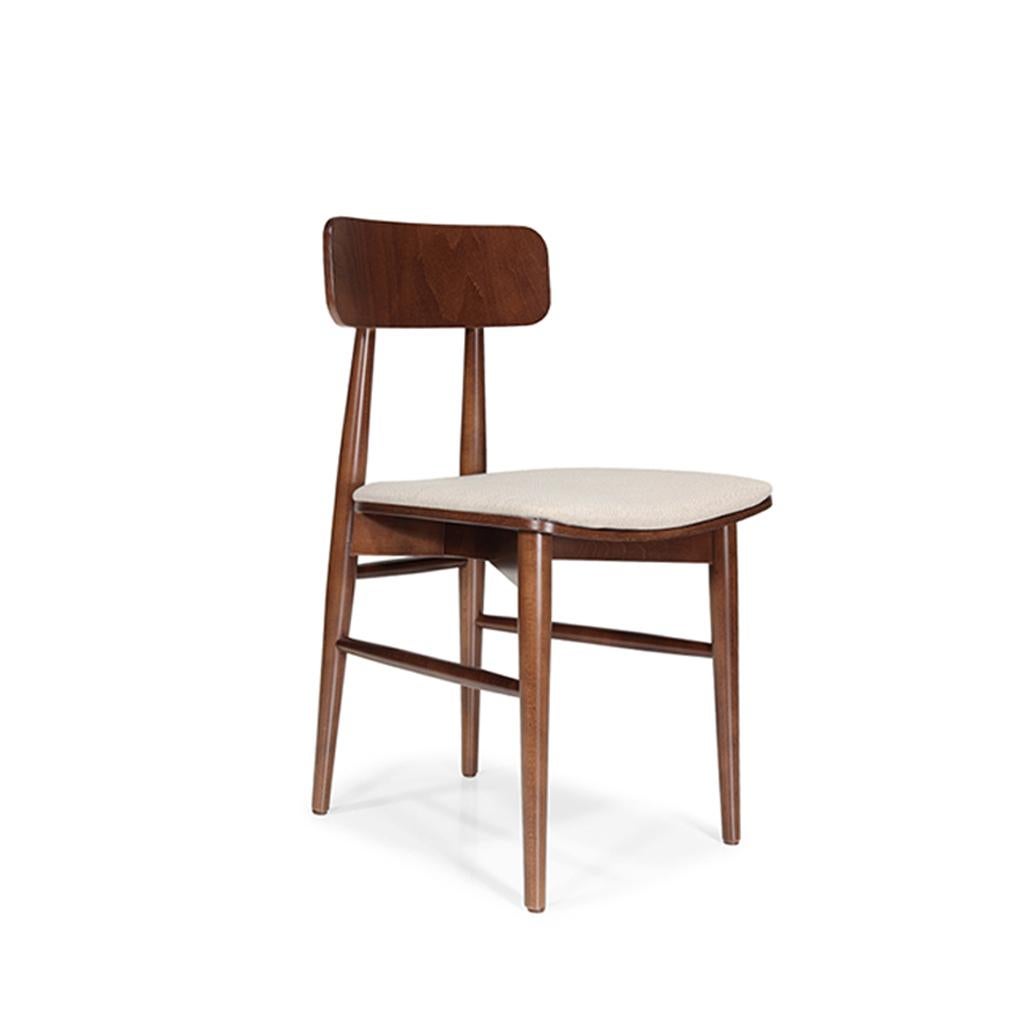 Frassino Sedia da pranzo SS3: Eleganza e semplicità con linee scultoree in vendita