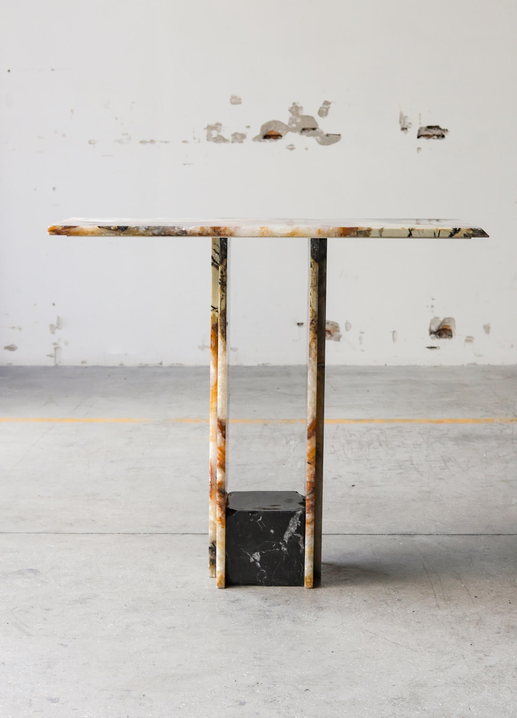 SSC103-1 console table by Stone Stackers
Limited edition of 5 products.
Dimensions: W 92 x D 39 x H 81 cm.
Materials: Patagonia and Marquina marbles.
Marble Structure: Patagonia
Marble Base: Marquina
Weight: 53 kg

Original console with an