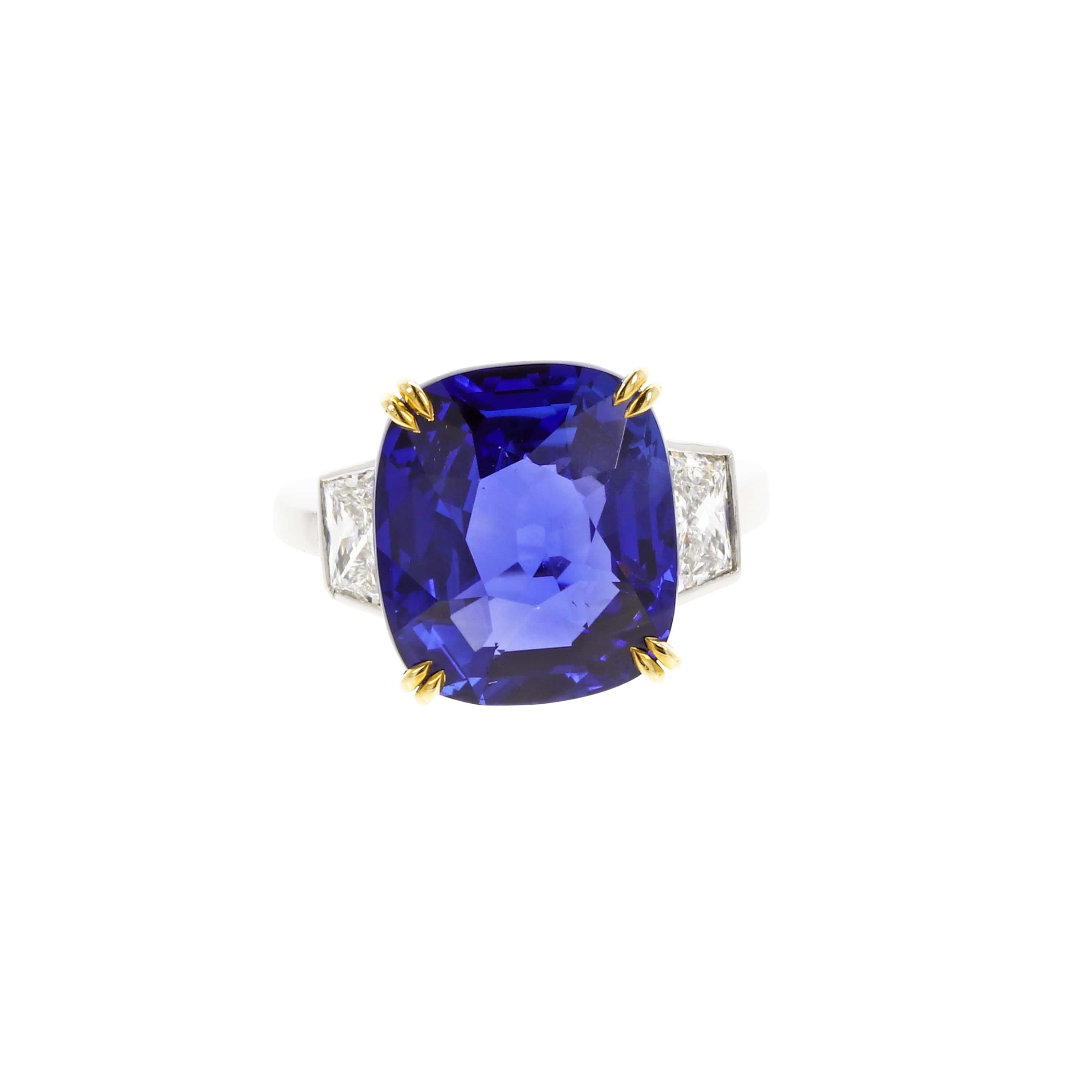 Featuring a superb sapphire, weighing 14.82 carats, flanked by two tapered baguette diamonds weighing approximately 1.50 carats in total. Accompanied by a SSEF gemological report stating that the sapphire is natural, of Ceylon (Sri Lankan) origin,