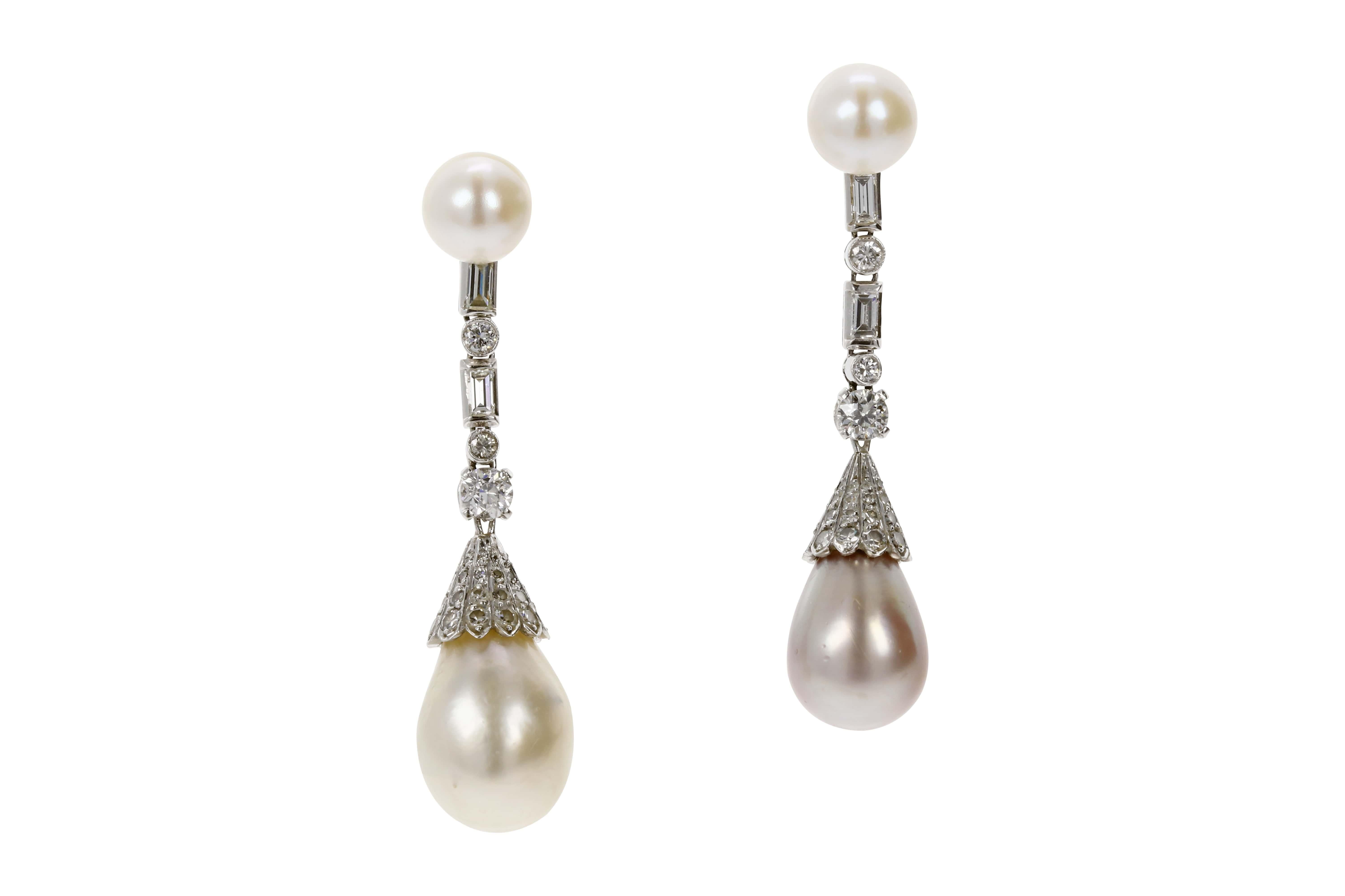 Antique earrings with two drop shape pearls and two round pearls. Accompanied by SSEF gemological report stating the 60 and 44 grain pearls are natural, saltwater variety, and the 14 and 16 grain pearls are natural, freshwater variety. The SSEF