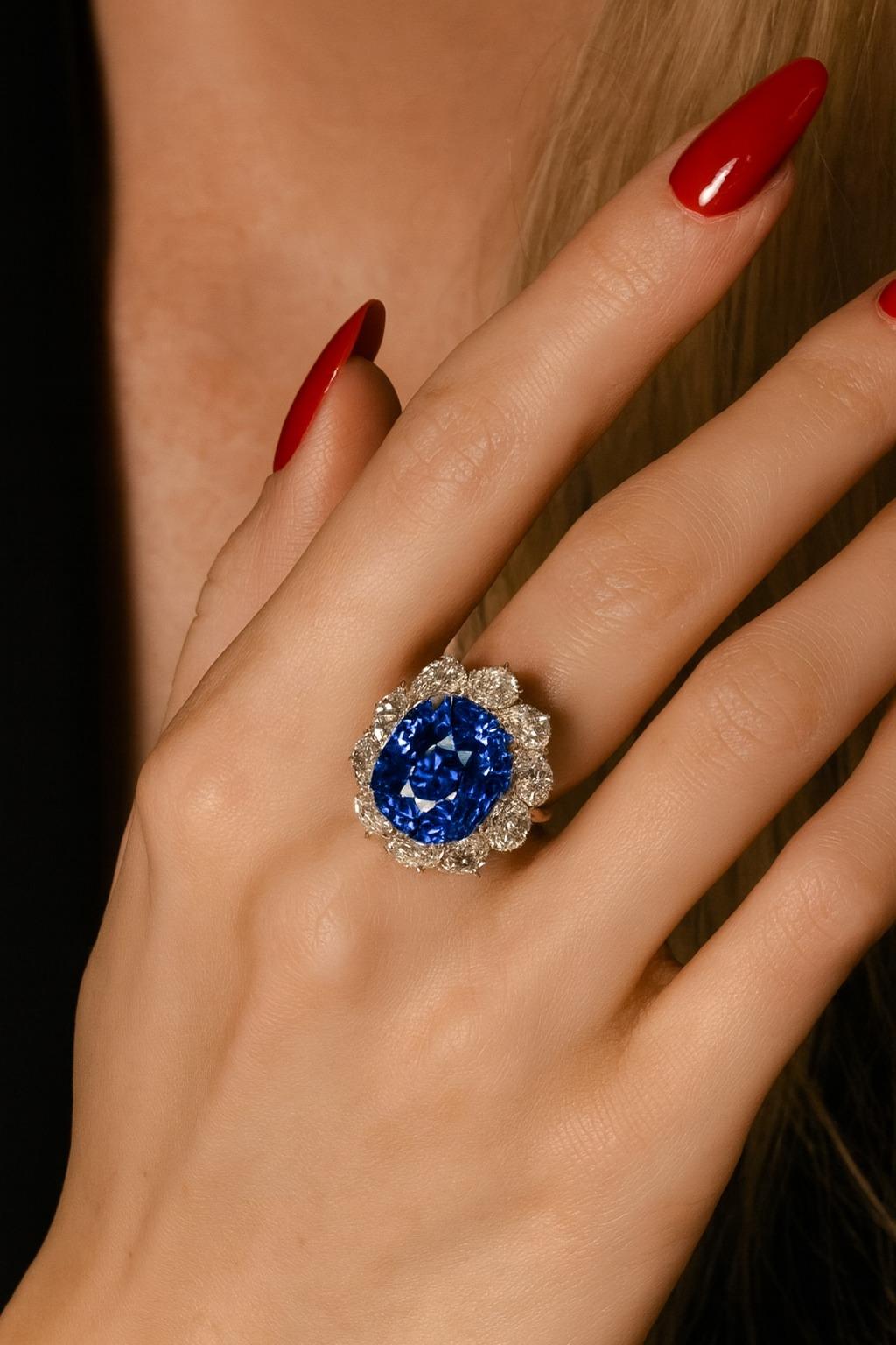 SSEF Certified 9.30 Carat Ceylon Sapphire Platinum and Diamond Ring

This exceptional ring showcases a magnificent 9.298 carat natural Ceylon sapphire, certified by the Swiss Gemmological Institute (SSEF). The sapphire, cut in an antique cushion
