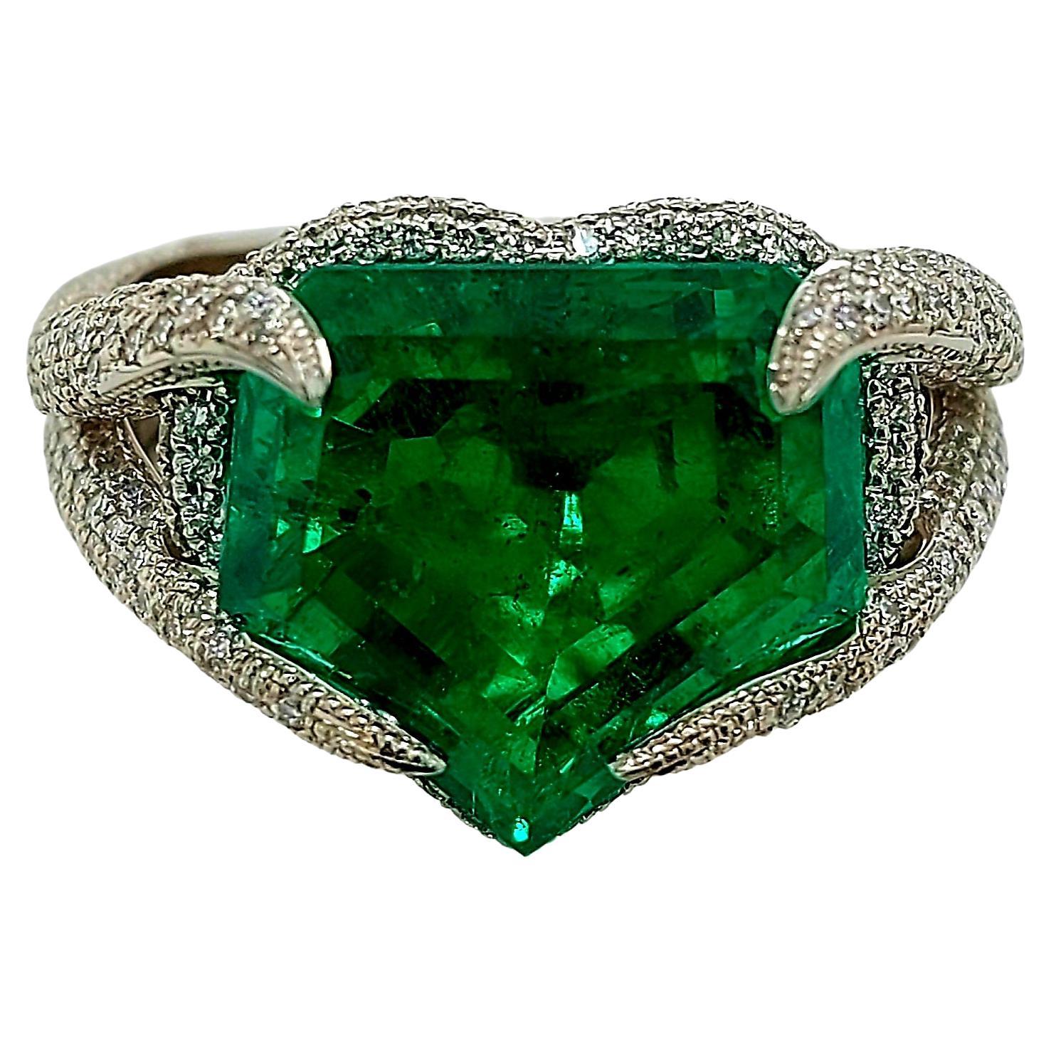 Magnificent Platinum 9.2 ct Colombian Emerald and Diamonds Unique Ring, With SSEF Certificate

Completely handmade, one of a kind

Emeralds are very difficult to photograph, actual stone is much nicer then on pictures.  

Emerald: Kite Shaped, Step