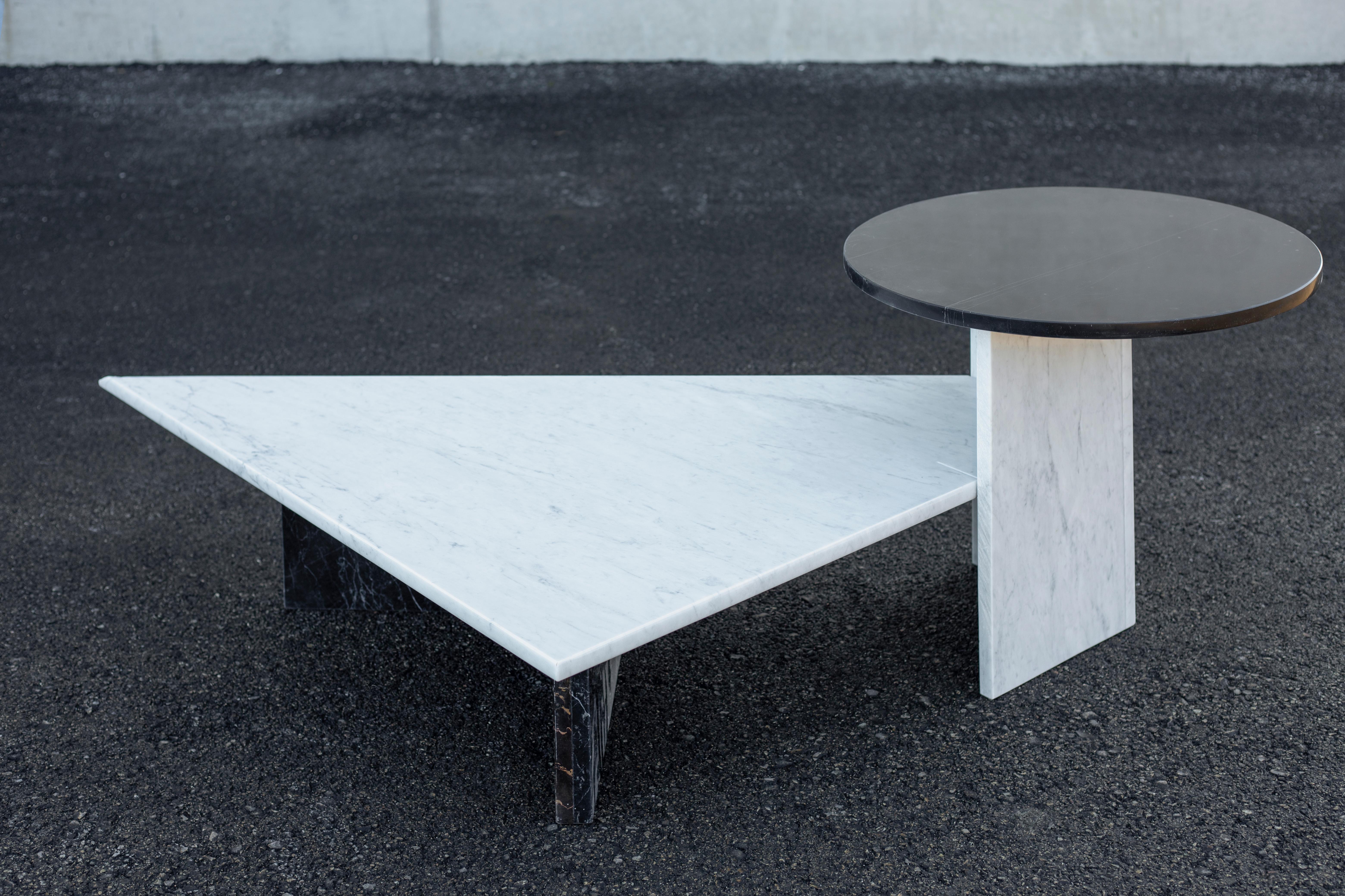 SST014 coffee table by Stone Stackers
Dimensions: D 162 x W 89 x H 48 cm
Materials: Marbles:
Marble top corner: Marquina
Marble structure: Carrara Marquina
Marble top: Marquina
Weight: 79 kg

An appealing geometrical tabletop combined with a