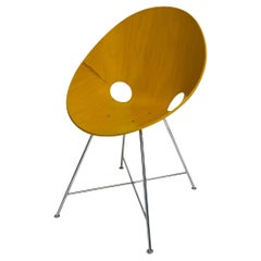 Chaises coquillage ST 664, conçues par Eddie Harlis