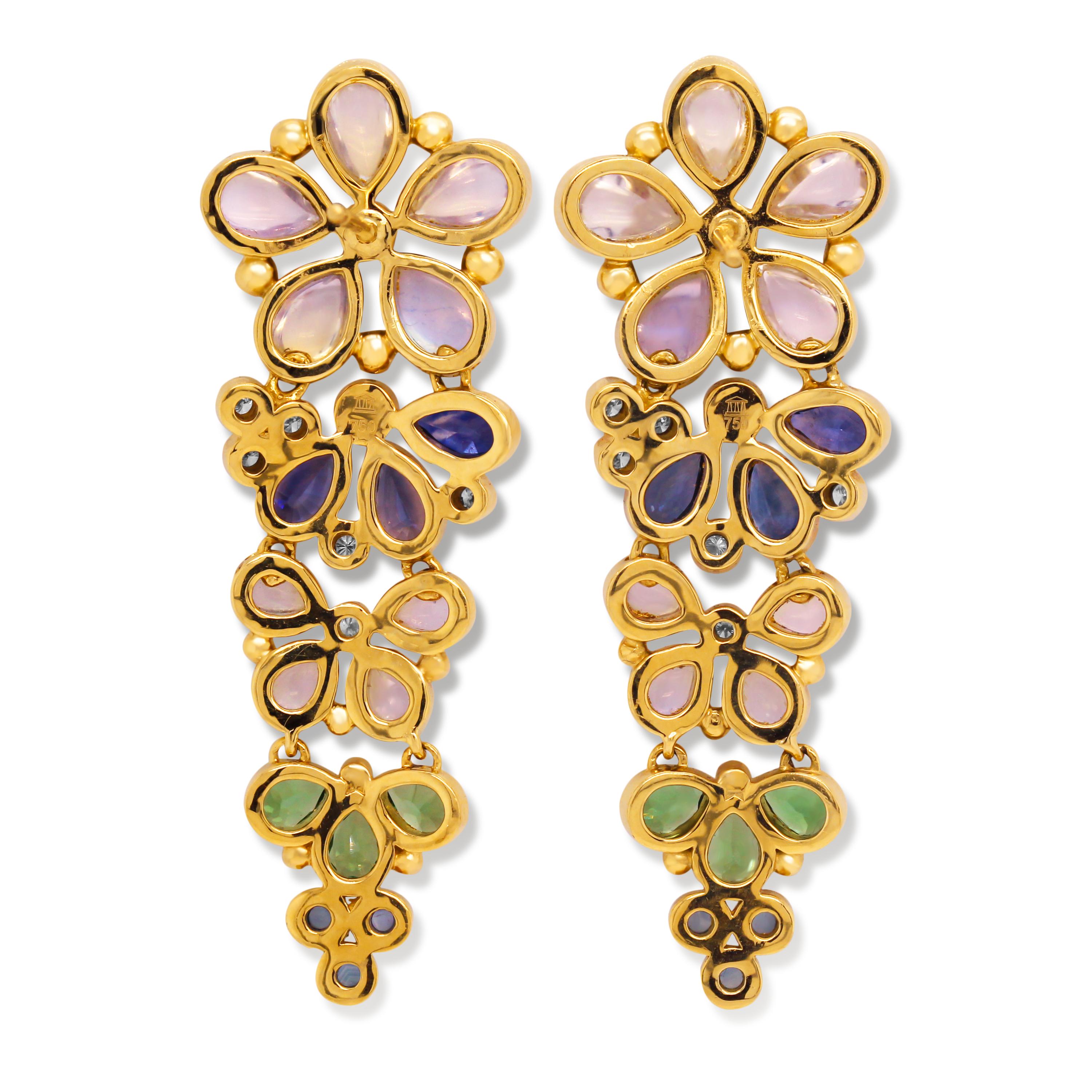 St. Clair l8K Rainbow Moonstone Tsavorite Blue Sapphire Diamond Floral Earrings

This gorgeous pair of earrings begins with five pear-shape, rainbow moonstones in a floral setting that drops to diamonds, pear-shape blue sapphires, a butterfly with