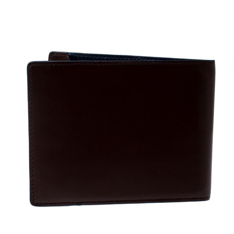 Fashioned in brown color, this D Line bifold wallet is crafted from leather. Coming from S.T. Dupont, this piece is nicely lined with leather and includes enough space to keep your cash and cards in its different slots and compartment.

Includes: