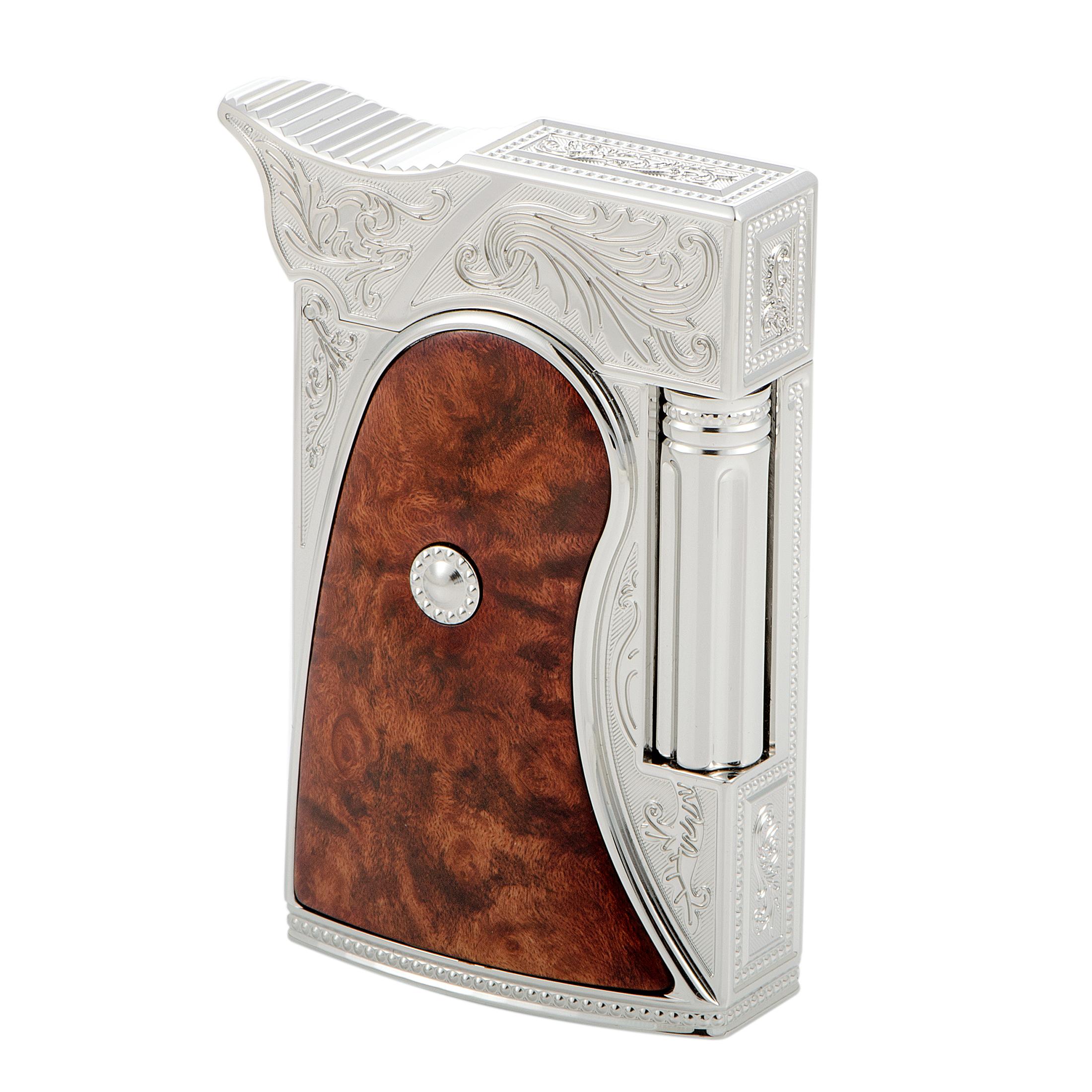 Inspired by the intriguing, adventurous Wild West era, this extraordinarily designed S.T. Dupont lighter boasts expertly crafted intricate décor reminiscent of antique guns. The lighter boasts palladium finish and beautiful heather wood, and it