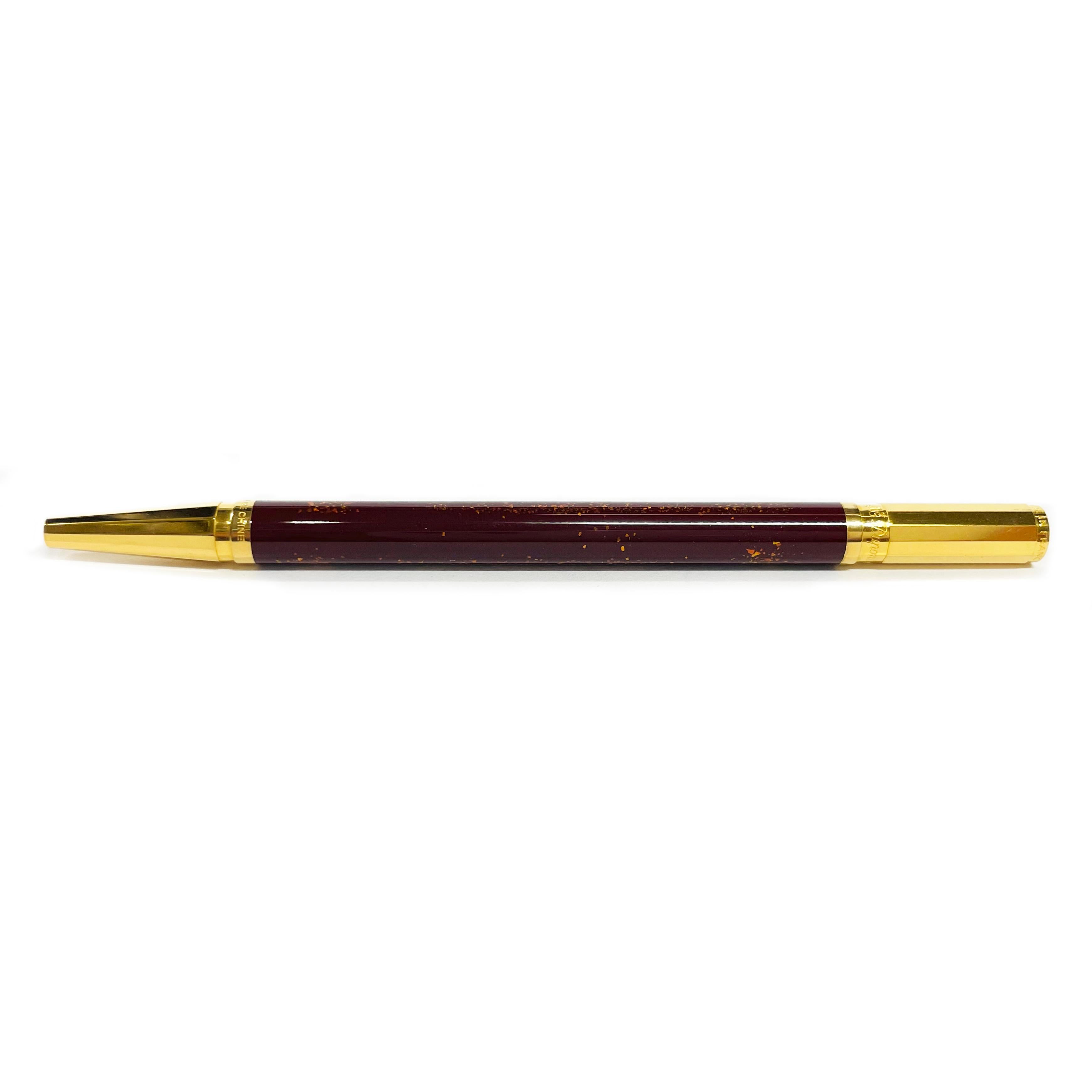 S.T. Stylo à bille Dupont plaqué or. Le stylo est surmonté de l'inscription AT&T. Dupont 