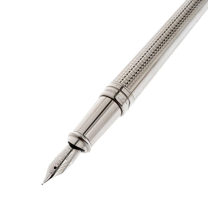 Royal looks and meticulous design define this fountain pen from S.T. Dupont. It comes magnificently detailed with a textured pattern. This piece truly is a well-engineered instrument to help with all your writings. Grand in design and extremely