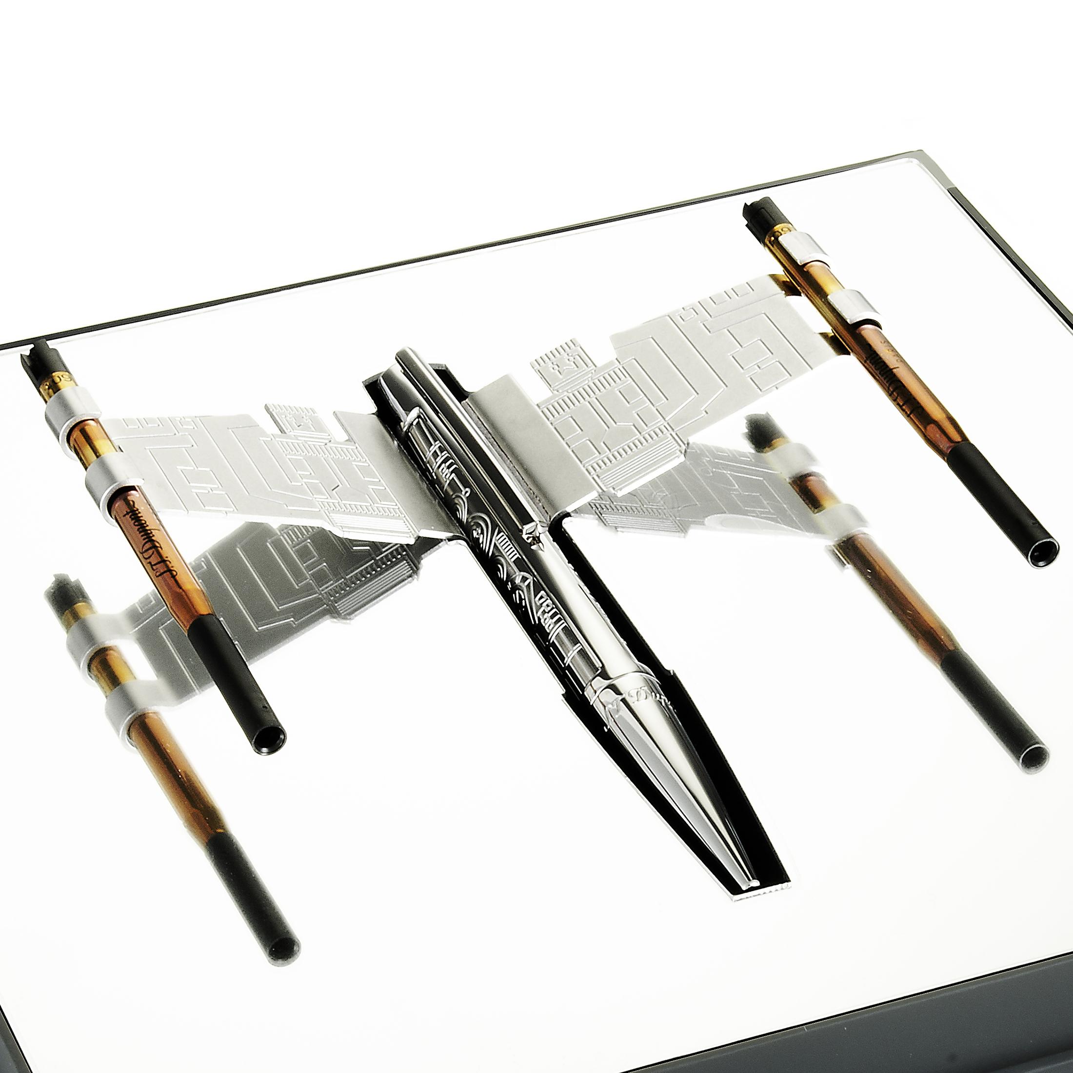 The design of this exceptional limited edition ballpoint pen from S.T. Dupont is inspired by the iconic X-wing starfighter from the Star Wars universe. The pen boasts palladium finish, engraved with a pattern that replicates the plan of the X-Wing