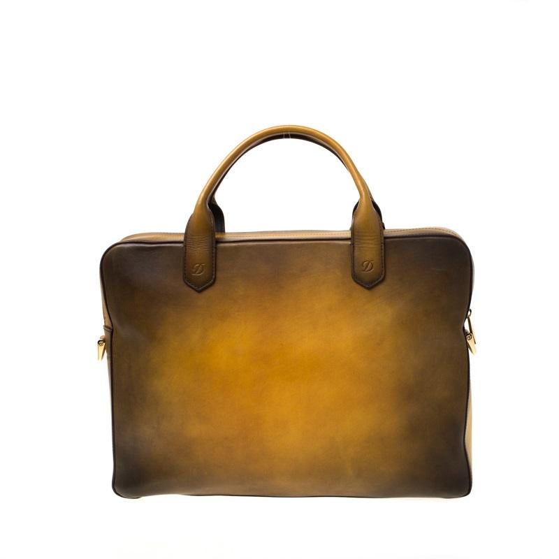 A practical bag for work and meetings, this Atelier Line D briefcase from S.T. Dupont will be your best companion. It features a minimal, fuss-free construction crafted from yellow and black ombre leather and secured with a top zipper. It comes