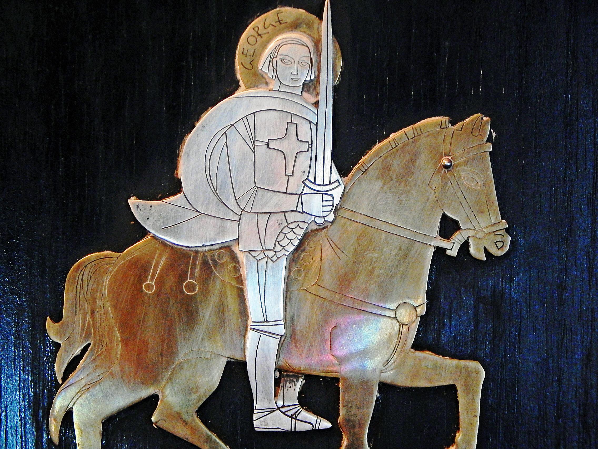 A superb and rare example of mixed-metal, midcentury wall sculpture, this panel depicting St. George and the vanquished dragon was crafted by Benedictine monks at the Talleres monastery in Quernavaca, Mexico in the 1960s. History does not tell us