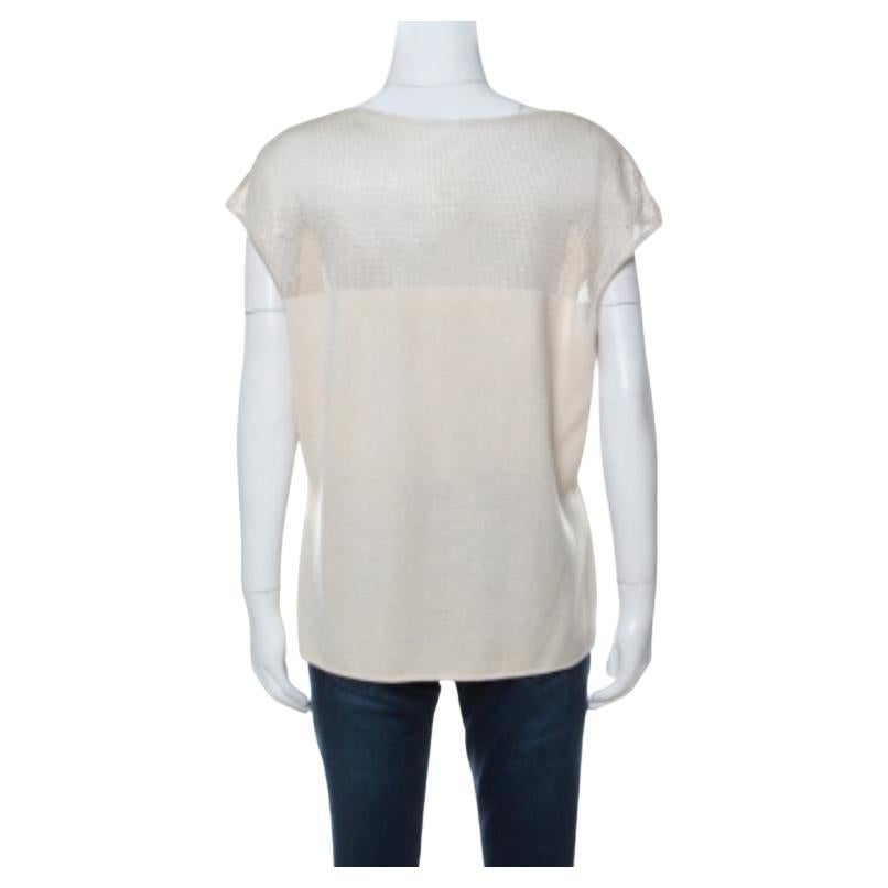 Dieses Oberteil aus dem Hause St. John eignet sich für eine Vielzahl von Outfits. Dieses Oberteil ist ein echter Hingucker mit dem perfekten Touch von Beige. Dieses Oberteil aus Mischgewebe hat einen leichten Rundhalsausschnitt, französische Ärmel
