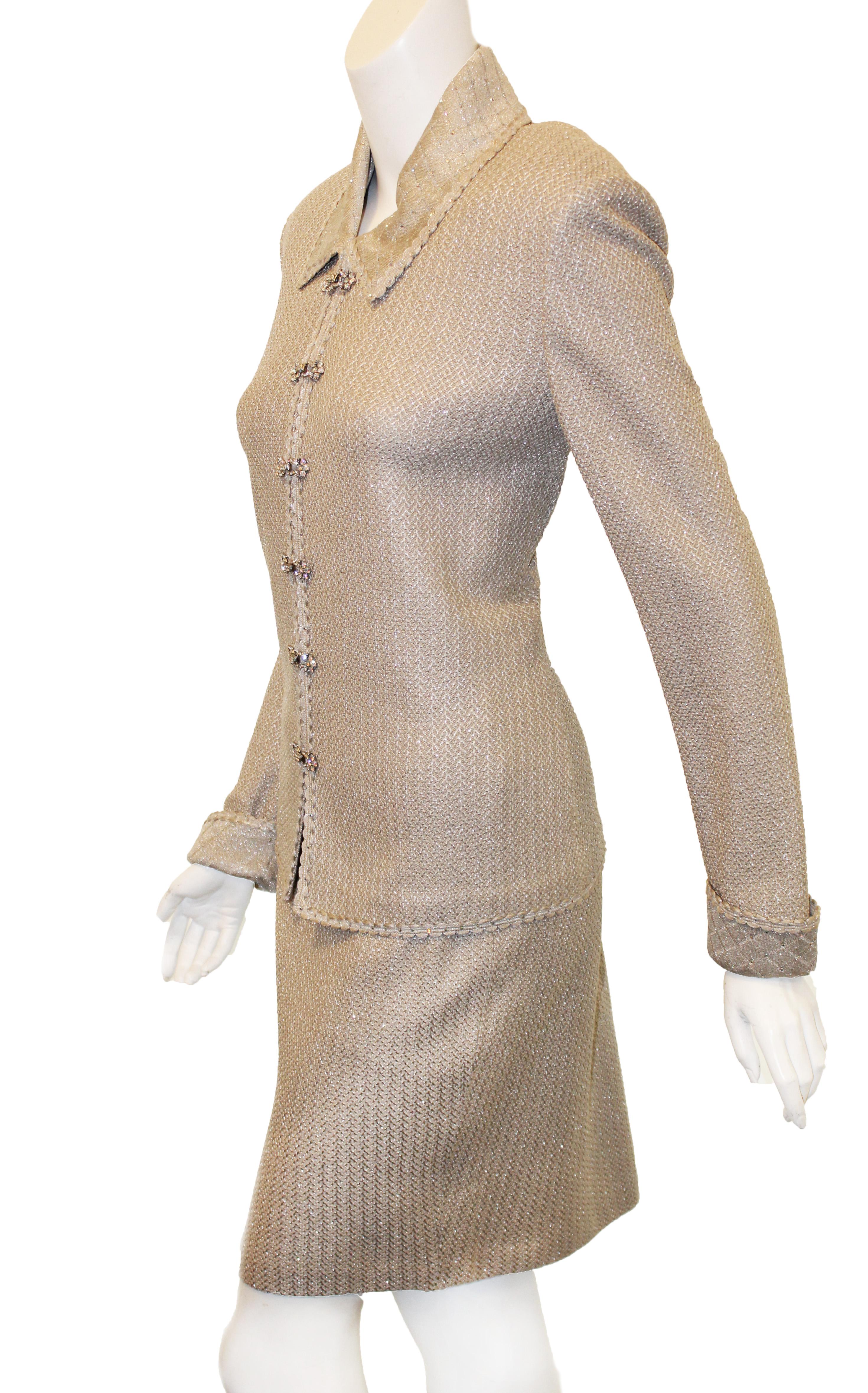 St. John Silver skirt suit is a classic but so currently smart.  This ensemble is outstanding and can be used together or separately depending on your mood of the day or night.  With a shirt collar and scalloped trim around the collar front opening,