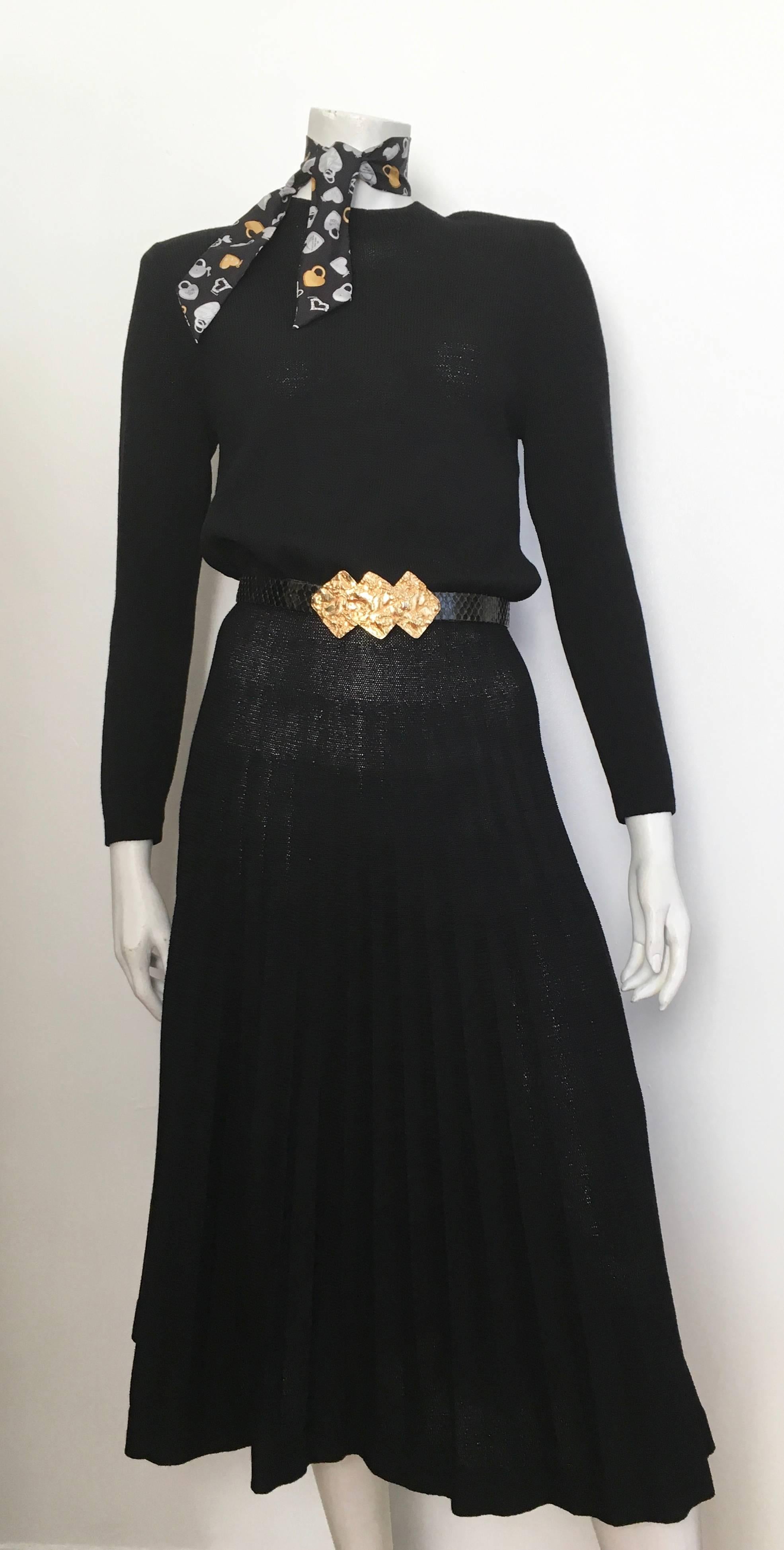 St. John for Neiman Marcus 1980s long sleeve black pleated knit dress is labeled a size 6 but will also fit a size 4.  The dress looks amazing on Matilda the Mannequin and she is a size 4.  Ladies make sure you have measured your bust, waist & hips