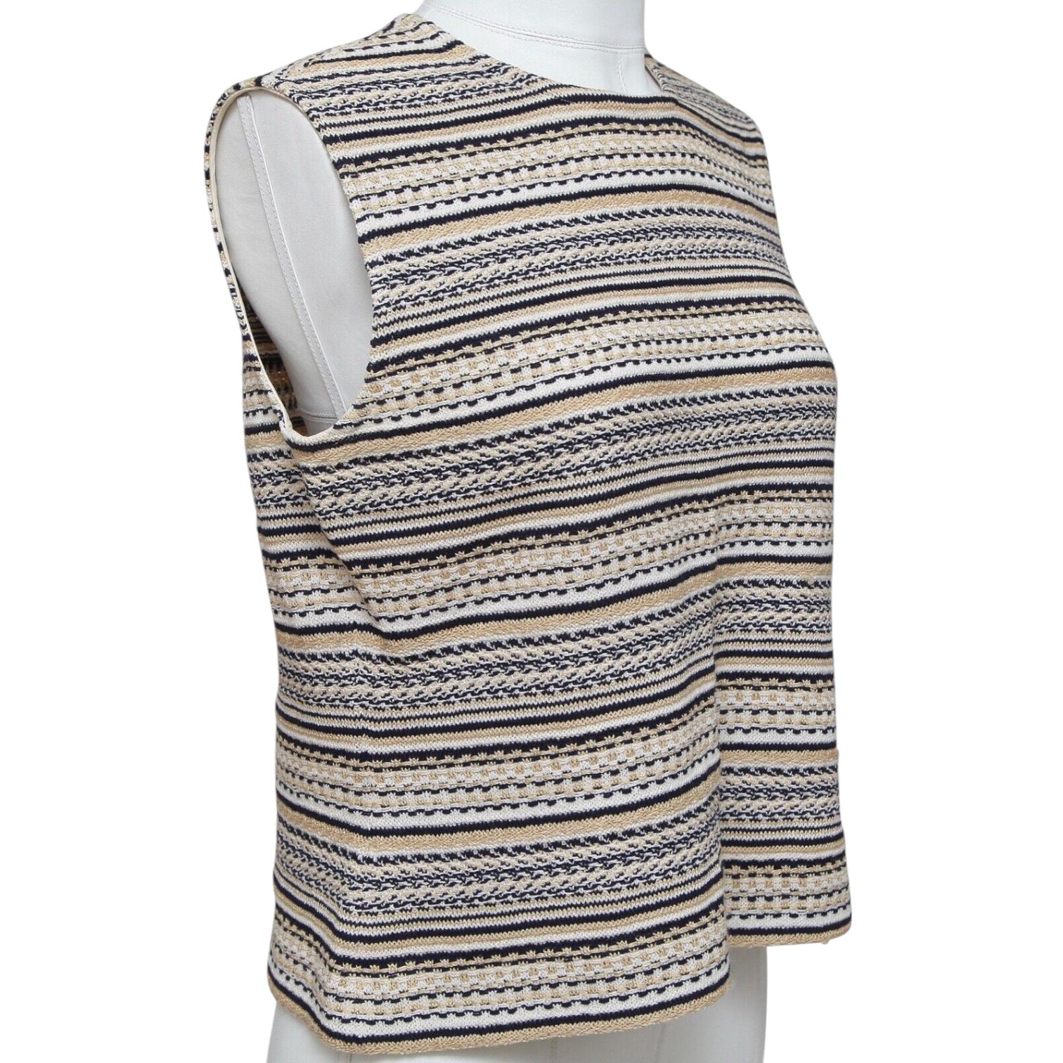 GUARANTEED AUTHENTIC ST. JOHN CLASSIC STRIPED SLEEVELESS KNIT  Design: - Classic sleeveless striped knit in black, white and tan colors with gold threading. - Pullover, top zipper on shoulder. - Crew neck. - Lightweight.  Size: M  Material: Tag