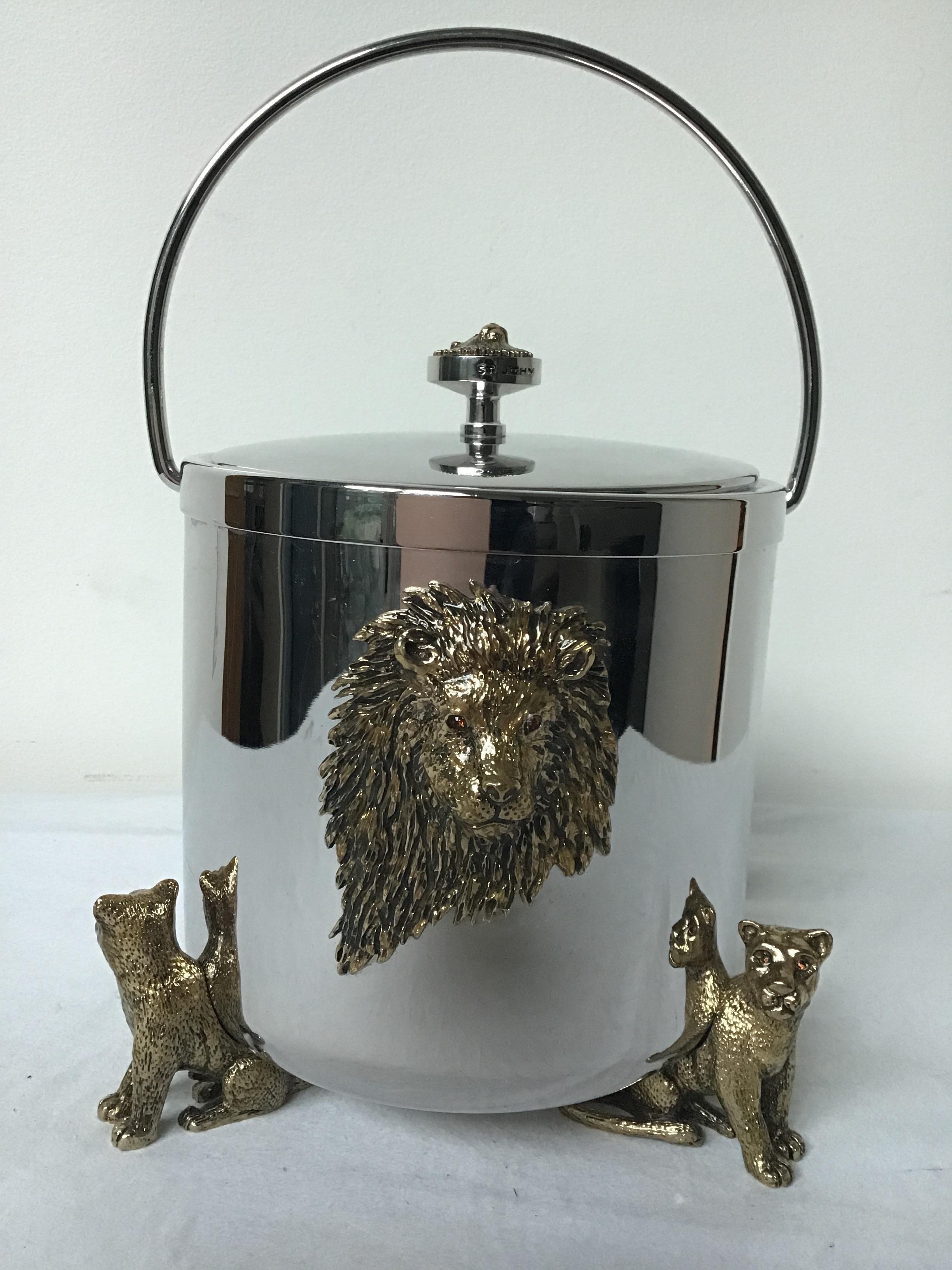 St John silver plate ice bucket adorned with lions with Swarovski crystals.