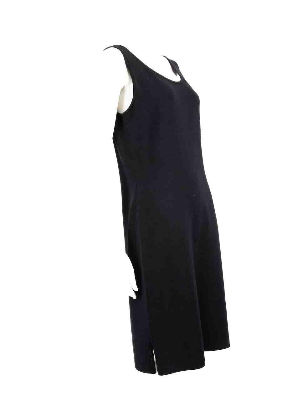 CONDITION is Never worn, with tags. No visible wear to dress is evident on this new St. John designer resale item.
 
 
 
 Details
 
 
 Navy
 
 Wool
 
 Knit dress
 
 Sleeveless
 
 Round neck
 
 Back zip and hook fastening
 
 Knee length
 
 
 
 
 
