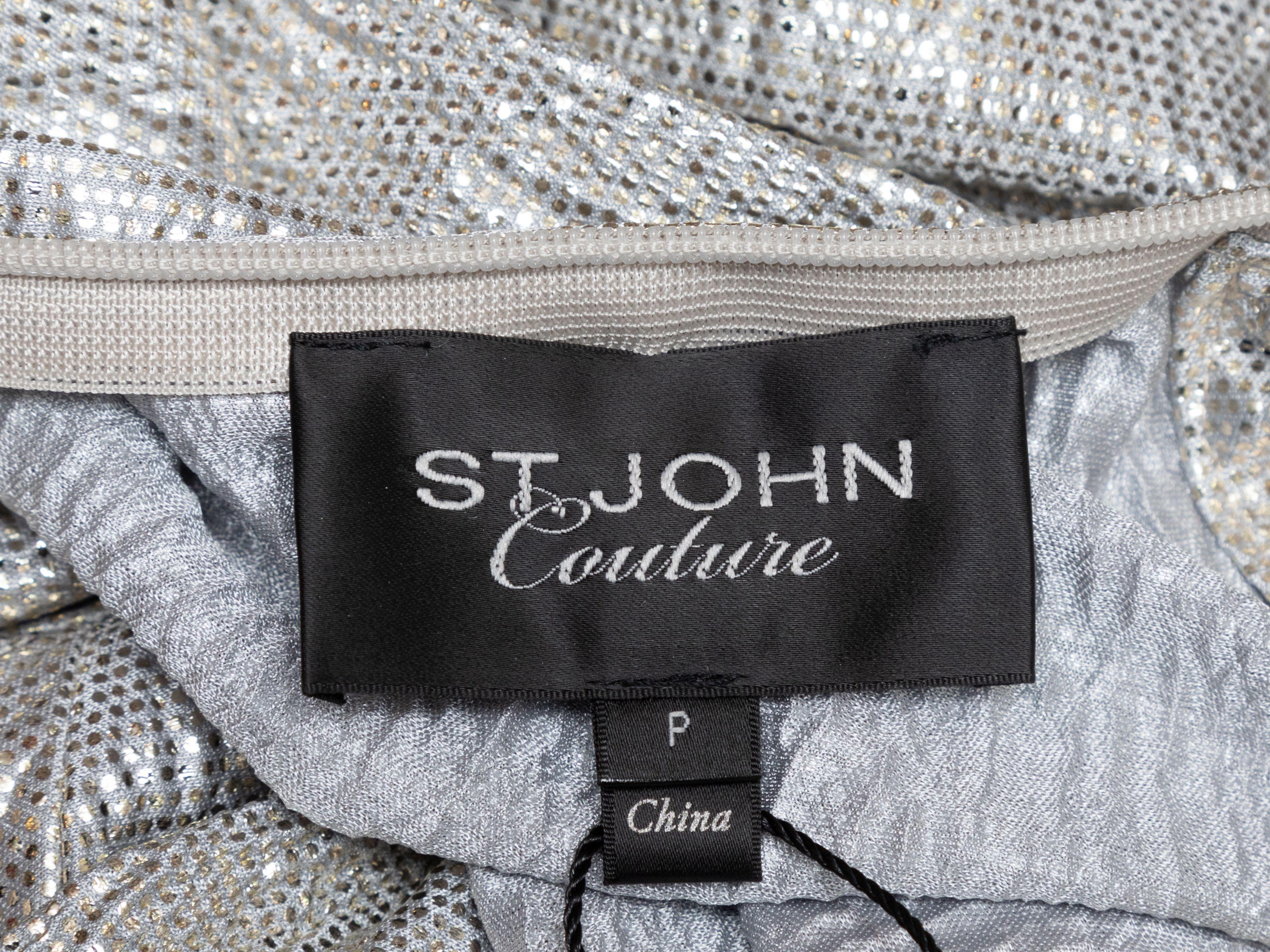 Product Details: Silver metallic long sleeve top by St. John. Pussy bow accent at neck. Zip closure at center back. Designer size P. 34