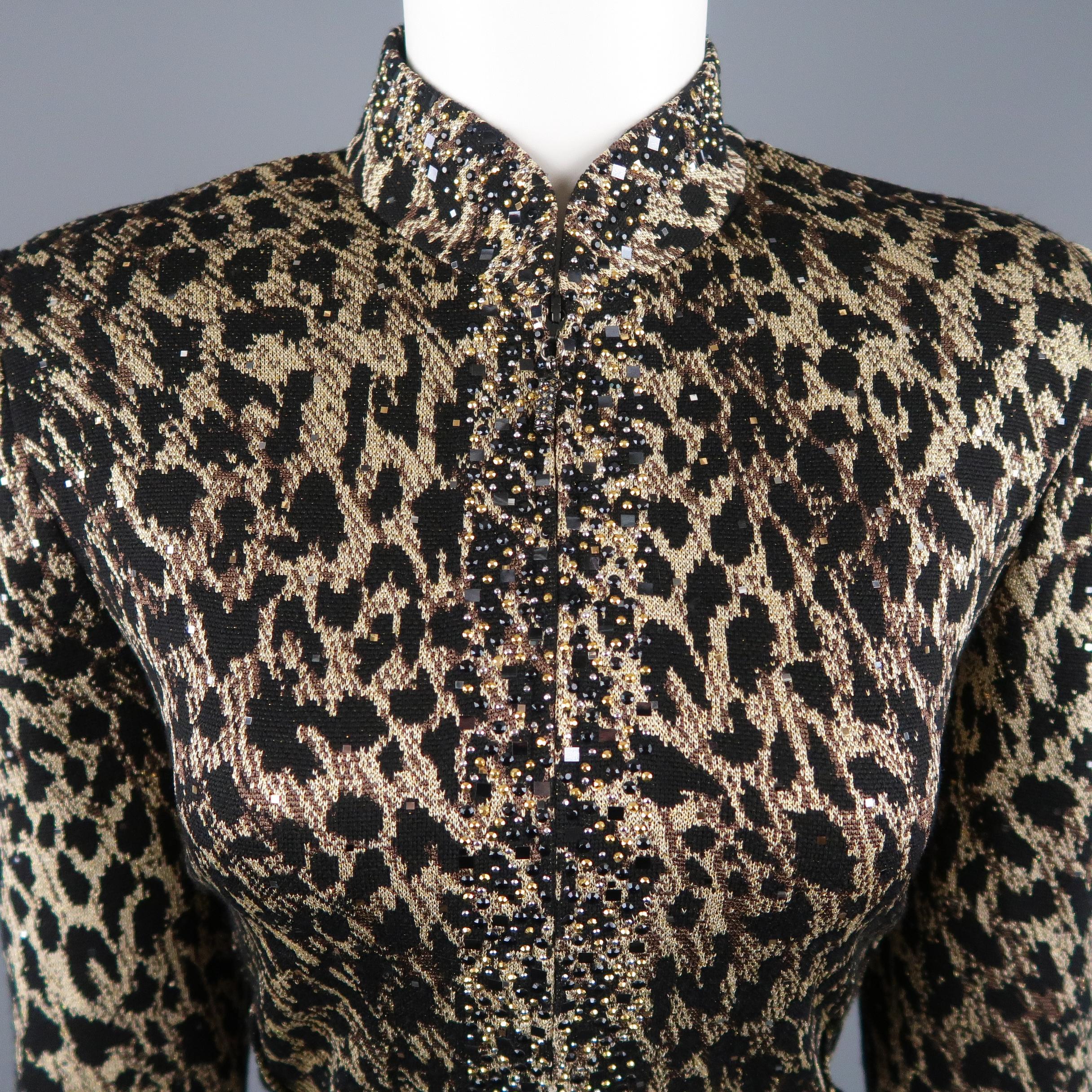 ST. JOHN EVENING jacket comes in black and gold leopard print wool blend sparkle knit with sequin throughout, strong padded shoulders, stud embellished trim, high collar, and zip front with rhinestone embellished pull tab. Matching dress available