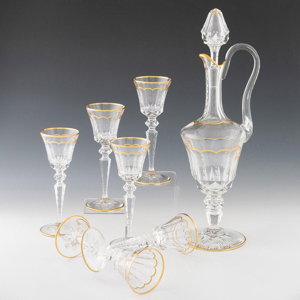 Intitulé : Verseuse St Louis et six verres à vin au motif d'excellence
Date : Moderne
Origine : Saint-Louis-lès-Bitche, France
Couleur : Clair avec dorure
Bouchon : flèche ou clocher creux en forme de gobelet avec lentille et entaille, diamants
