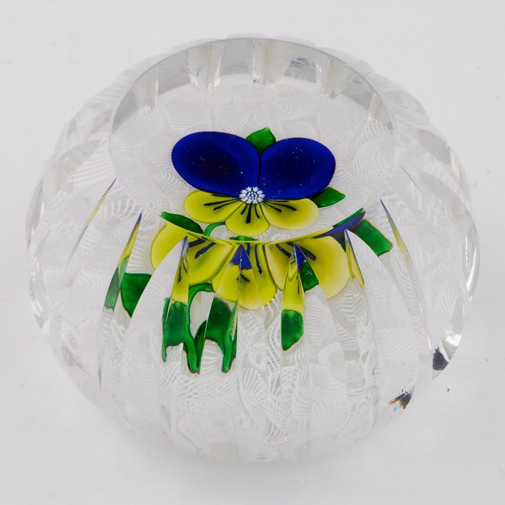 St Louis Pansy on Muslin Ground Paperweight, 1980

Additional Information:
Date: 1980
Origin: France
Features: A stunning lampwork blue pansy, stems and leaves on a muslin ground, one top and eighteen side facets
Marks: An SL1980 signature