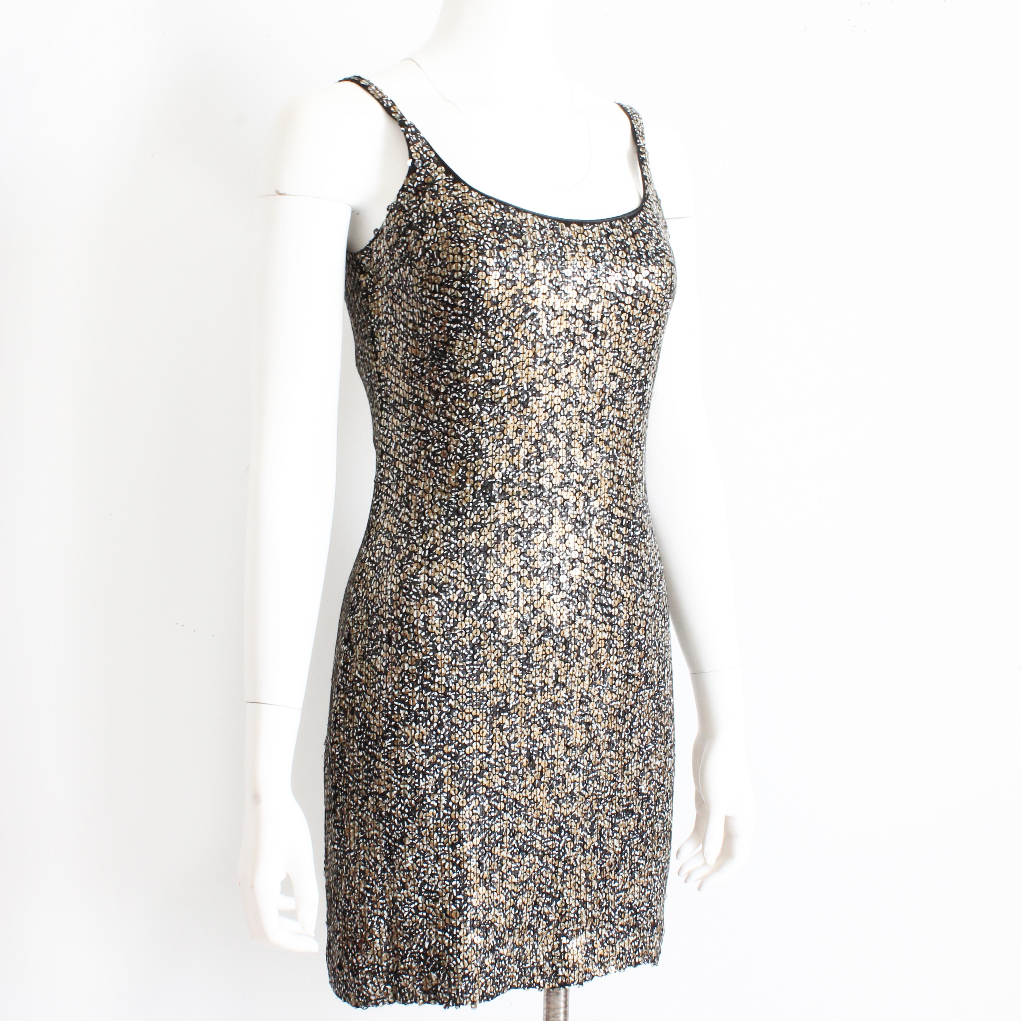Authentic, preowned, vintage St Martin by Jeanette sexy embellished cocktail dress, likely made in the 90s by designer Jeanette Kastenberg. The perfect party dress that's so easy to style. The matte sequins give it just the right amount of twinkle