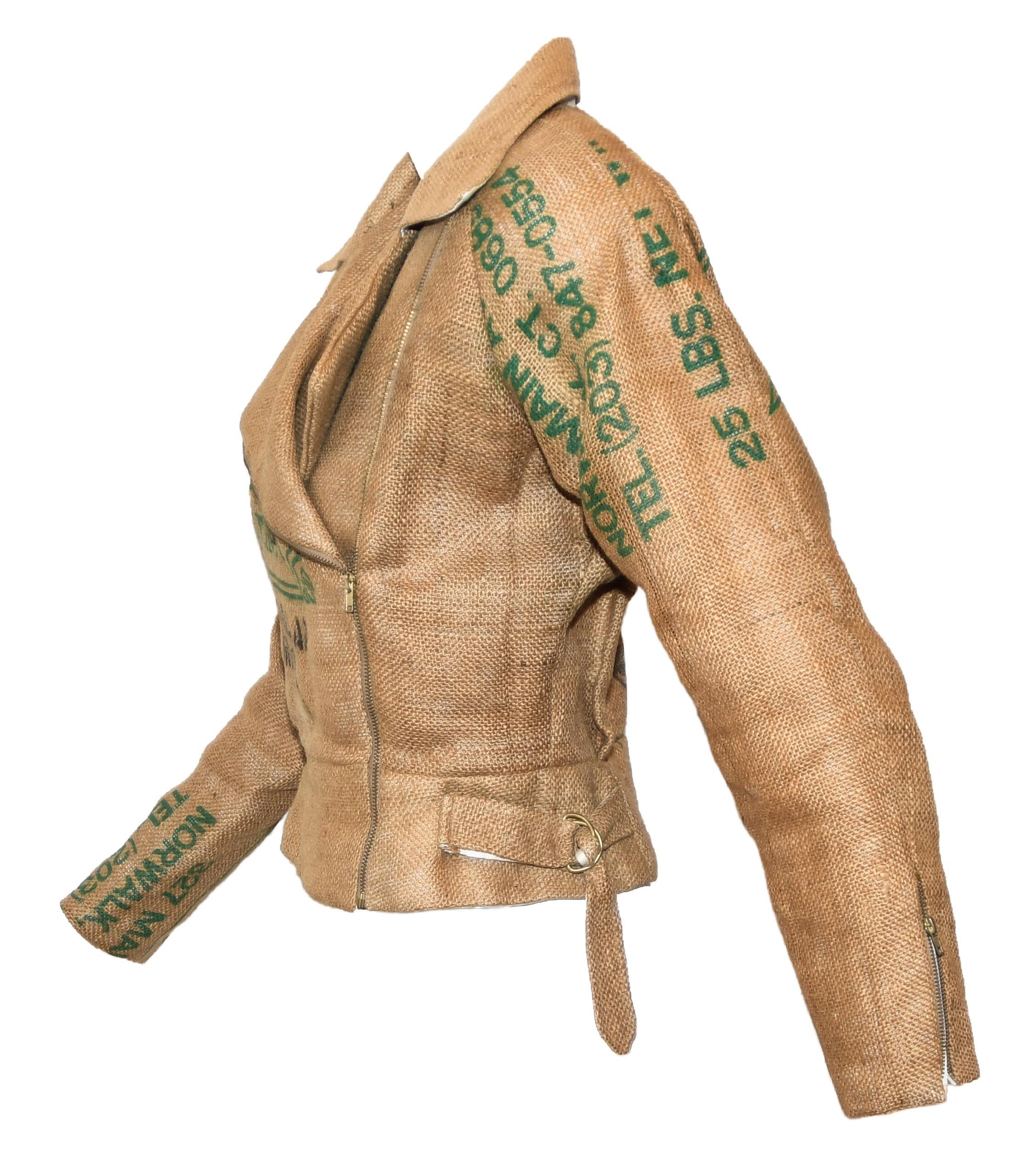 St. Martin by Jeanette is a unique and whimsical bomber style burlap jacket that was crafted from a real coffee burlap sac.  This one of kind jacket is a true conversation piece, you will be noticed, but who doesn't want to be?  A perfect jacket to