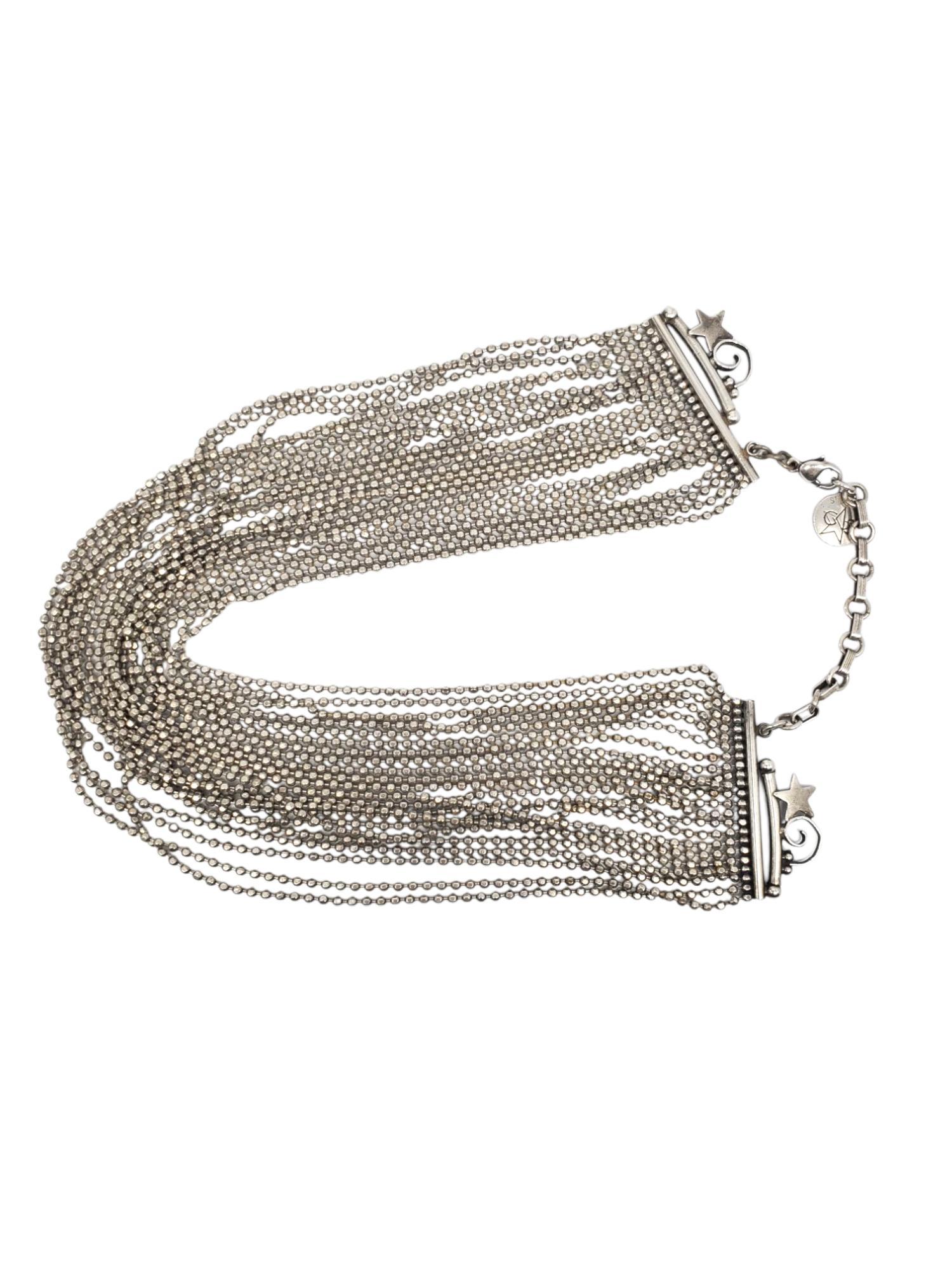 Tropez Collar de cadena de bolas de varios ramales 

Este atrevido collar presenta numerosos hilos de cadenas de bolas de plata de ley que crean un efecto de collar drapeado con un diseño de estrella y espiral con cierre de langosta de St.