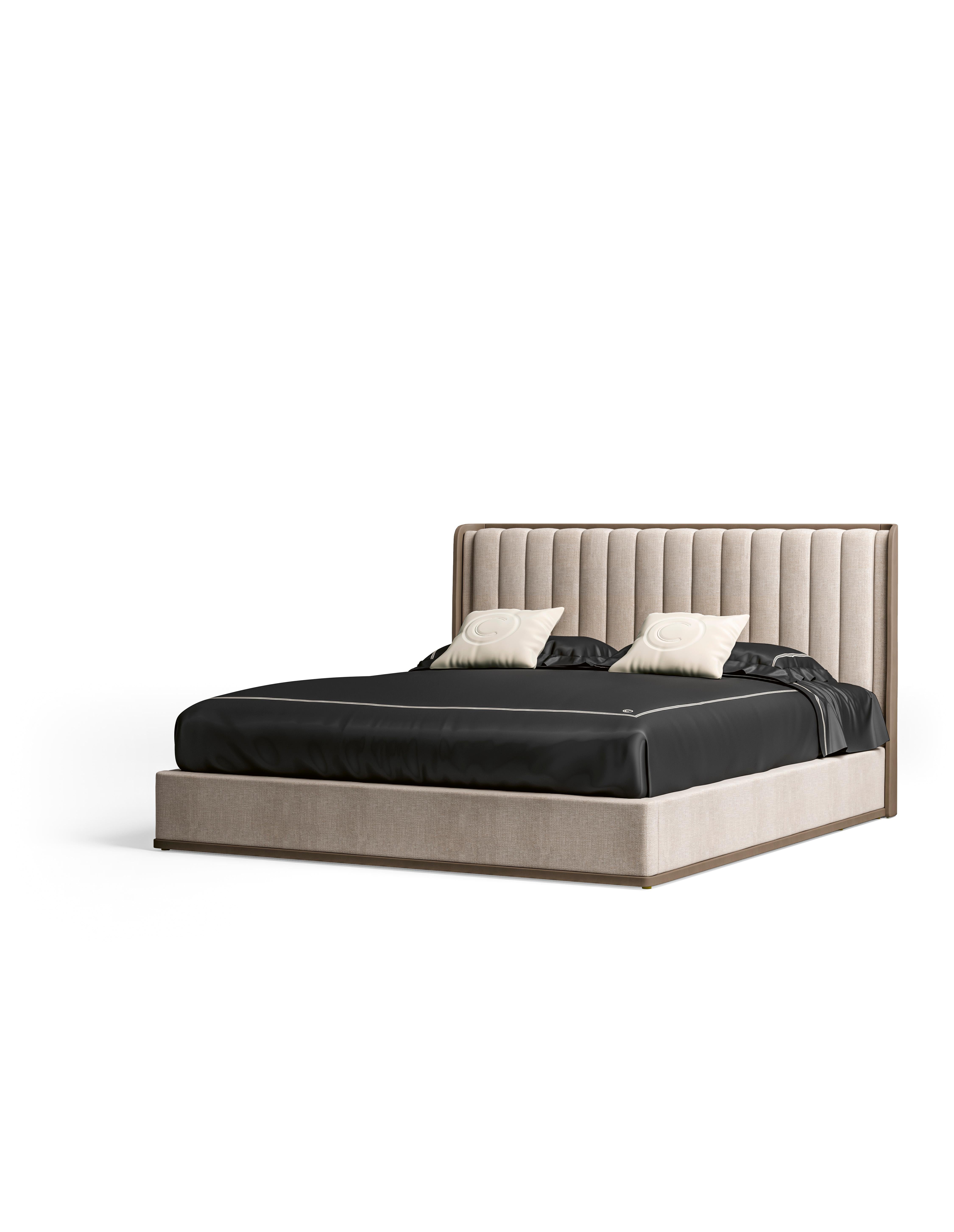 A bed with an integrated storage box, designed to maximize space and functionality. The frame is crafted from high-quality leather, giving it a sleek, refined appearance. The headboard is generously padded and can be upholstered in either fabric or