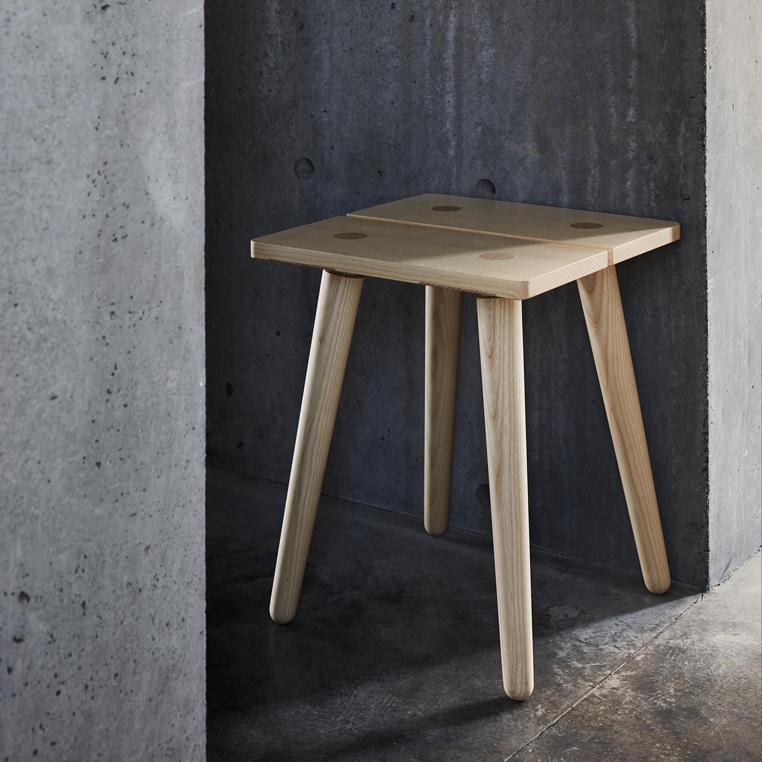The Stabellenstuhl, or stable stool, is our modern take on a Swiss staple, found inside any Alpine home. Its 100% solid European ash seat is held together by turned legs and strong joinery. Any weight applied to the seat gains extra stability