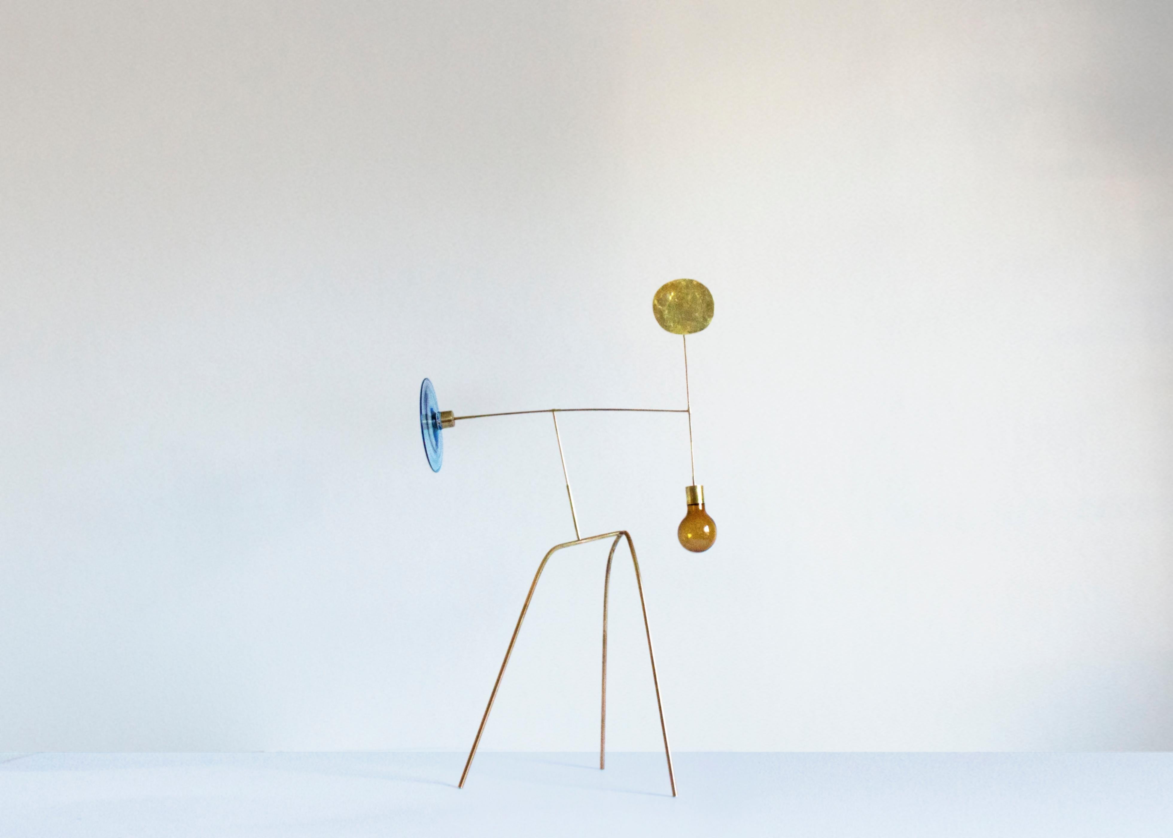 Stabile no. 40, by Milla Vaahtera
Dimensions: 44 x 25 x 73mm


Dialogue is a series of mobiles and stabiles made of free-blown glass and hand-worked brass.

Vaahtera began to work on this series in May 2017 together with glassblowers Paula