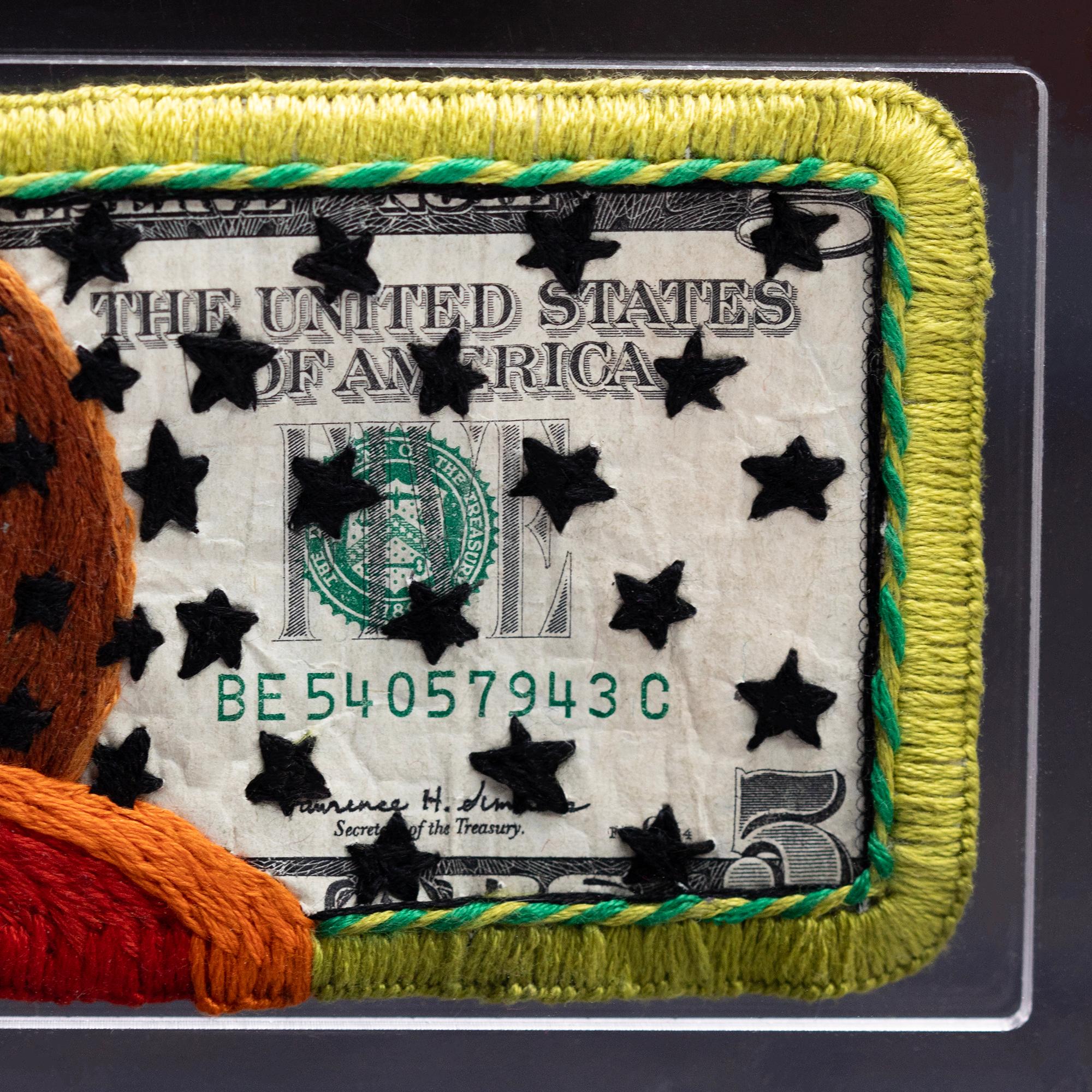 Stacey Lee Webber 

Lincoln Star Robber

7.25” x 3.75” acrylic case size

hand stitched US twenty dollar bill

2023