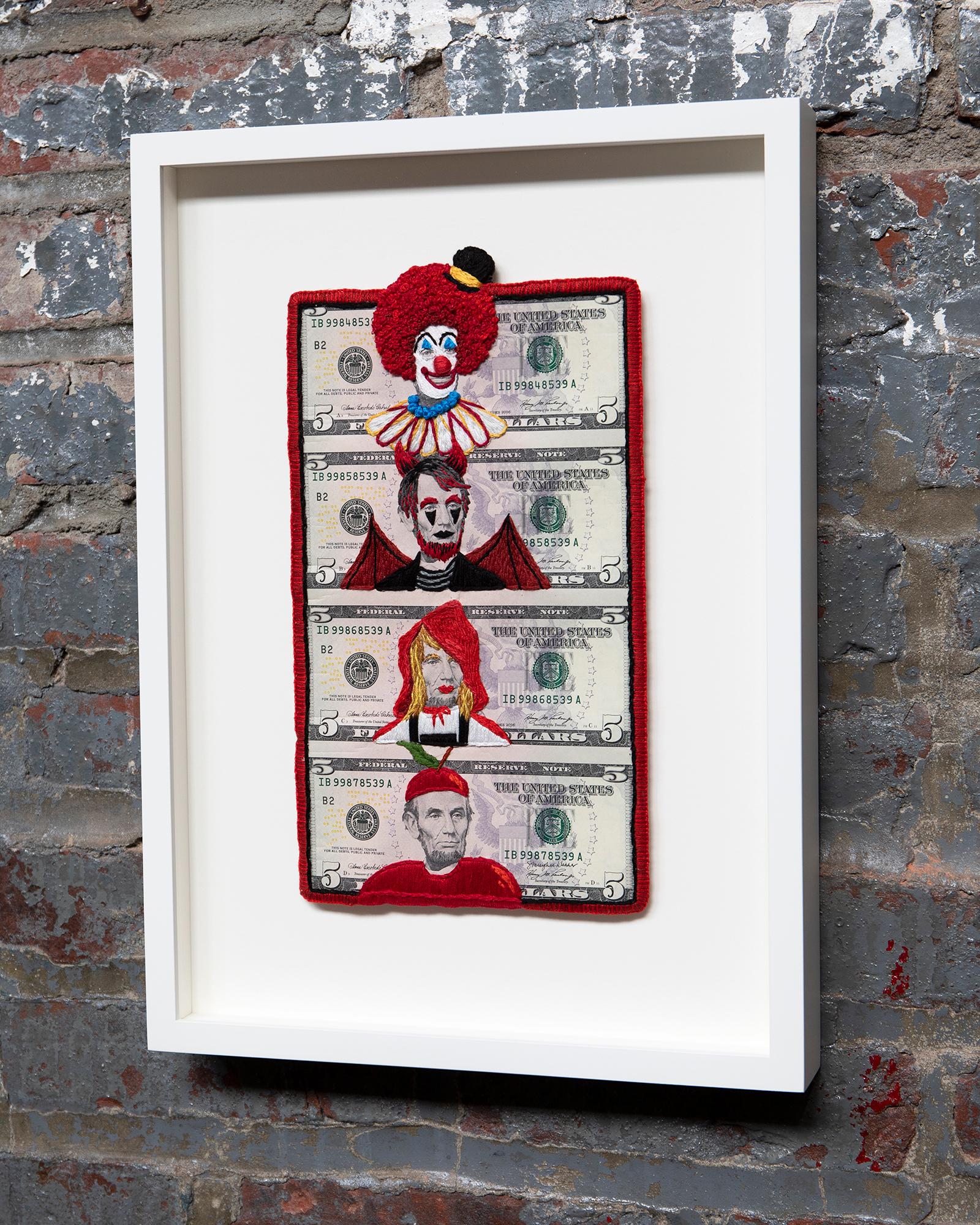 Stacey Lee Webber

Rainbow Costumes: Red Lincoln

15.75” x 11.5” 

hand stitched cotton thread, uncut 1x4 US five dollar bills, framed, glass face

2022