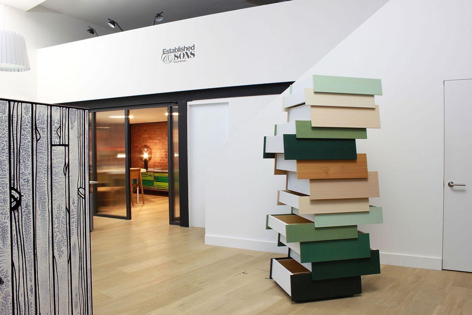 STACK
Raw Edges/Shay Alkalay
Challenging the conventions of a traditional drawer unit, Stack consists of individual, multi coloured drawers that appear suspended above one another and open in both directions, creating an irregular composition. THE