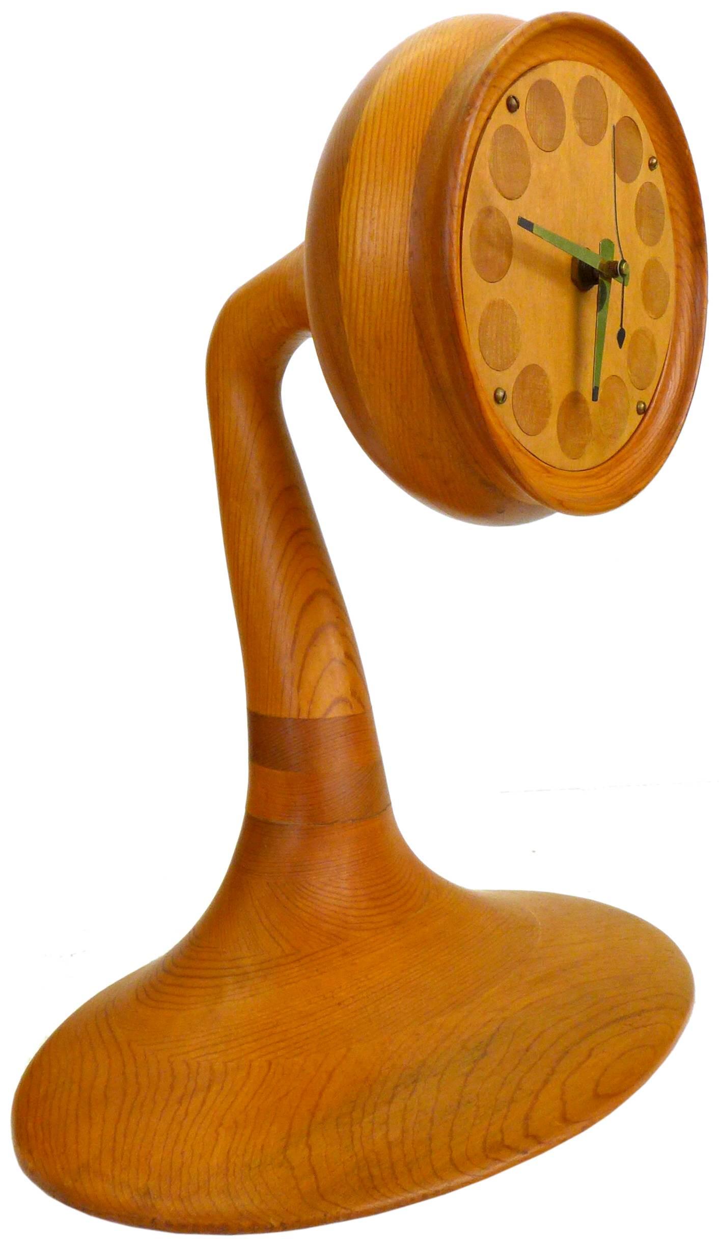 A wonderfully sculptural and well executed American craft table clock, signed 