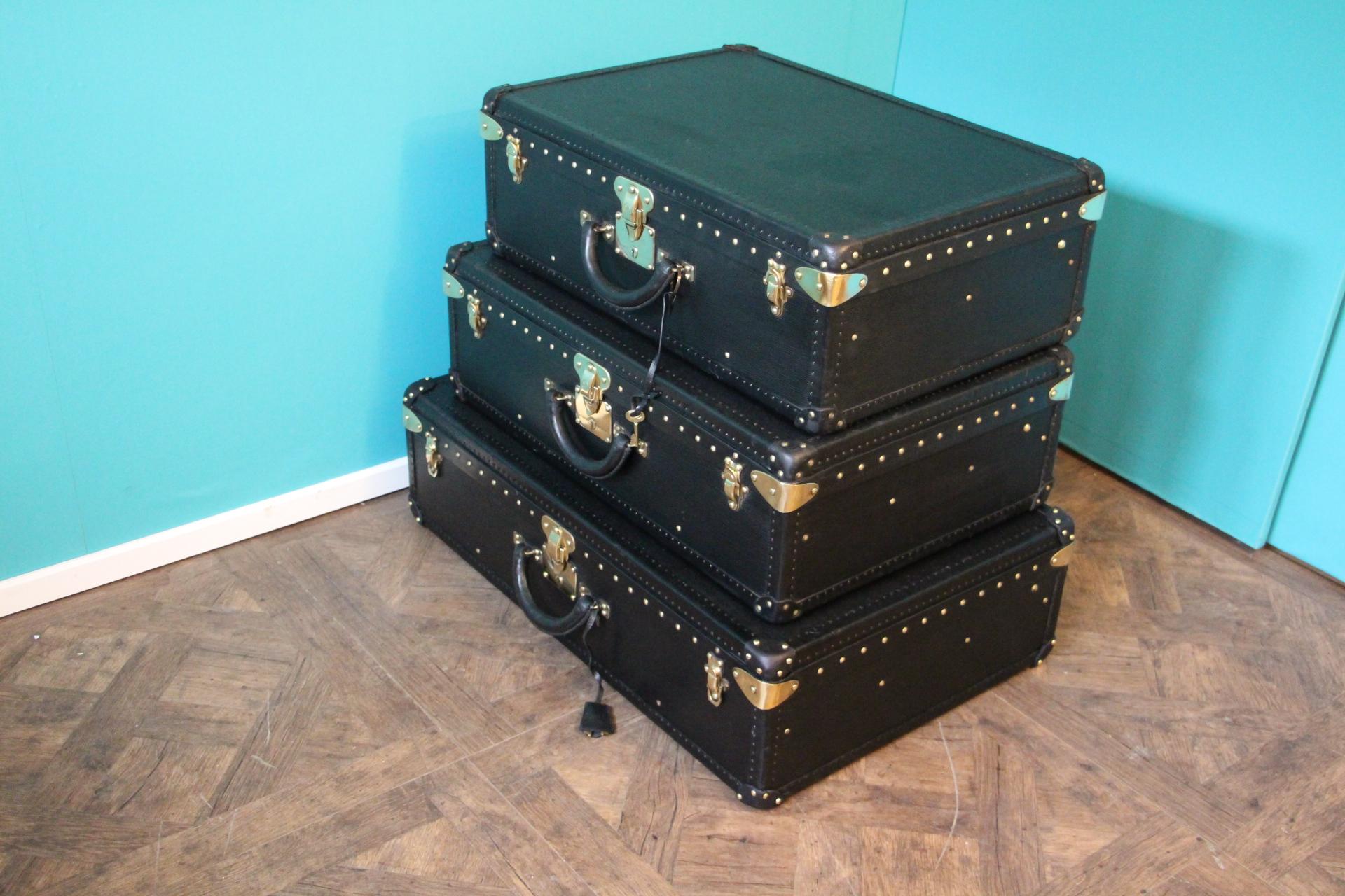 Stack of Black Louis Vuitton Alzer Suitcases, Louis Vuitton Trunks Louis Vuitton 1