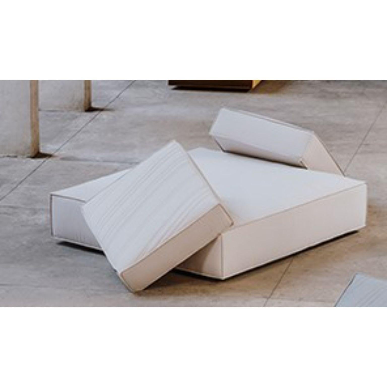 Stack pouf by Nendo.
Pouf with cushion.
Materials: upholstery: fabric.
 Structure: black lacquered MDF.
Dimensions: W314 x D180 xH90 cm.
 HS 42 cm.

Also available in leather.
  

Stack is a cushion casually tossed on top of another