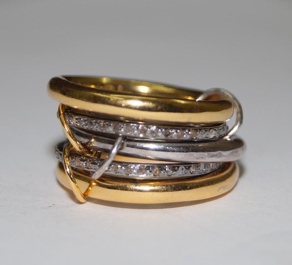 This beautiful stack of 5 rings with natural diamonds consists of:
Diamond= natural pave diamonds
Diamond color- white with a tint of grey
Metal- Silver
Purity- 925 (sterling silver)
Metal color- oxidized silver look and yellow gold plating