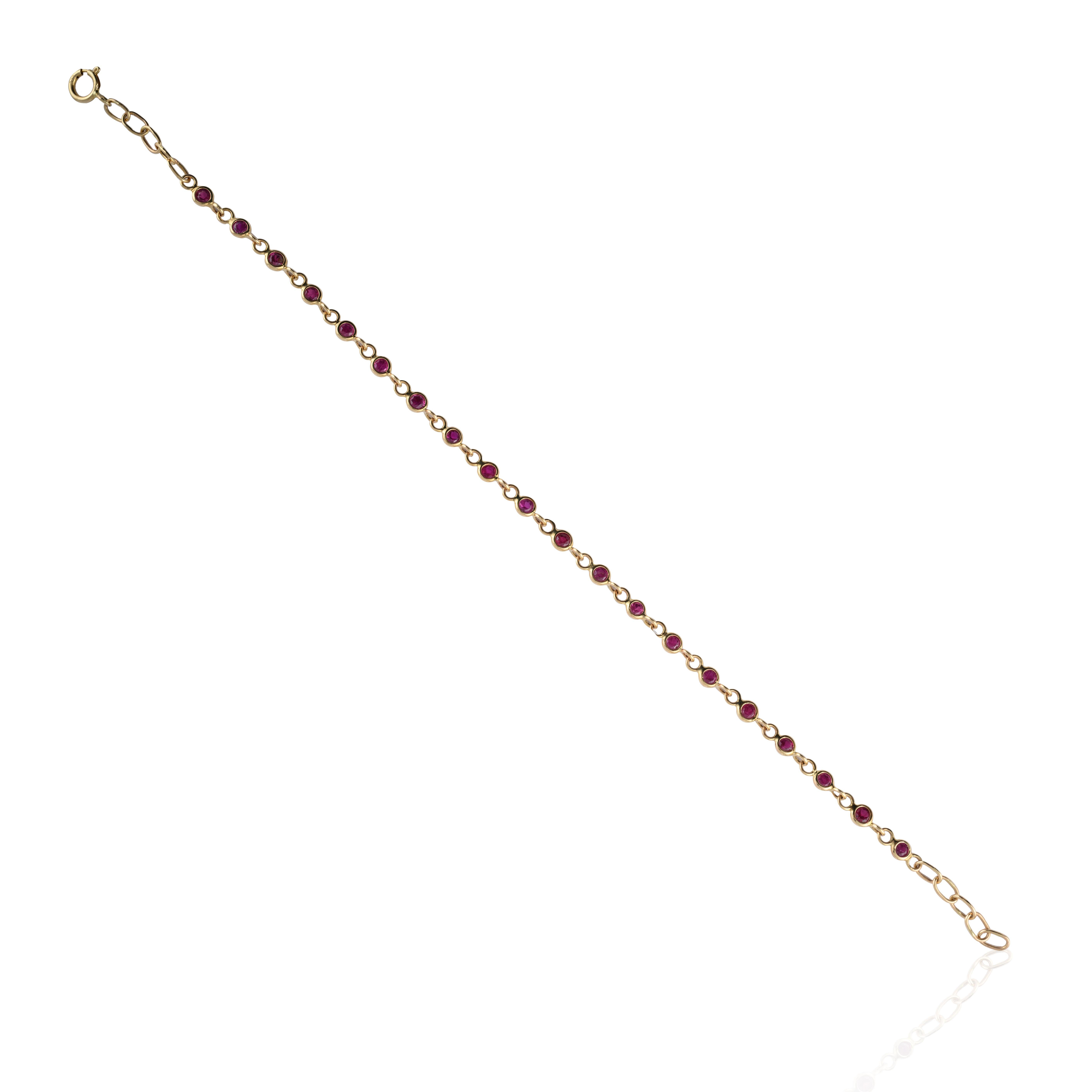 This Stackable Ruby Link Chain Bracelet in 14K Gold showcases 20 endlessly natural ruby, weighing 1.52 carats. It measures 7 inches long in length. 
Ruby gemstone improves mental strength. 
Designed with perfect round cut ruby linked with chain to