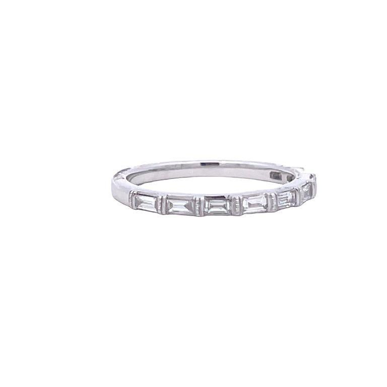 Beautiful half-way diamond baguette in 14KW white gold with white diamonds 0.33CT, very elegant design. Indulge in the enchanting allure of this exquisite baguette ring and let its enchanting beauty represent your distinctive taste and refined