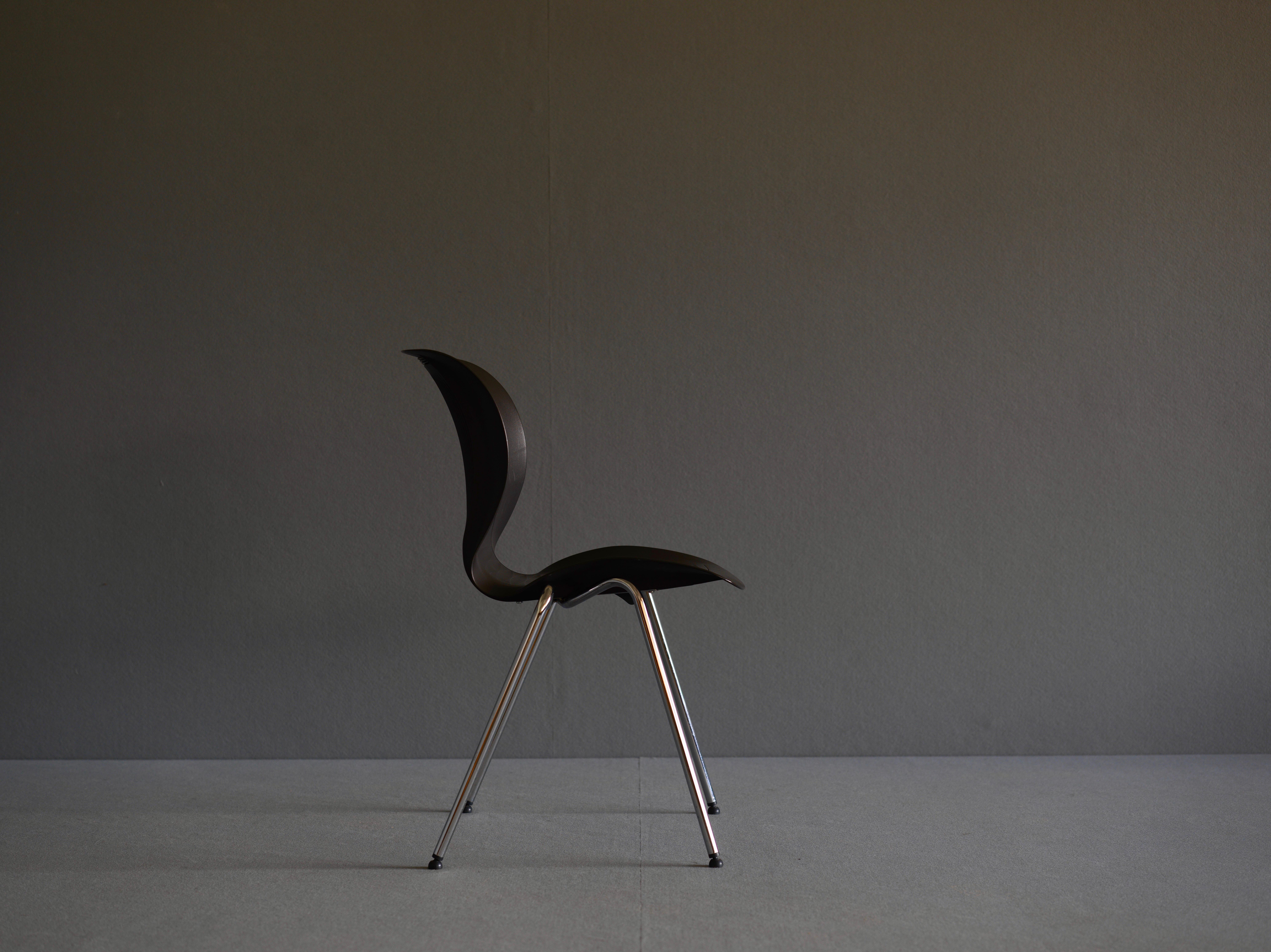 Well designed chair by Alfred Homann. It has a moulded polymer shell with chromed steel legs. The chairs are stackable and have an industrial look. As with all Fritz Hansen manufactured pieces they are ergonomically sound and of good quality.